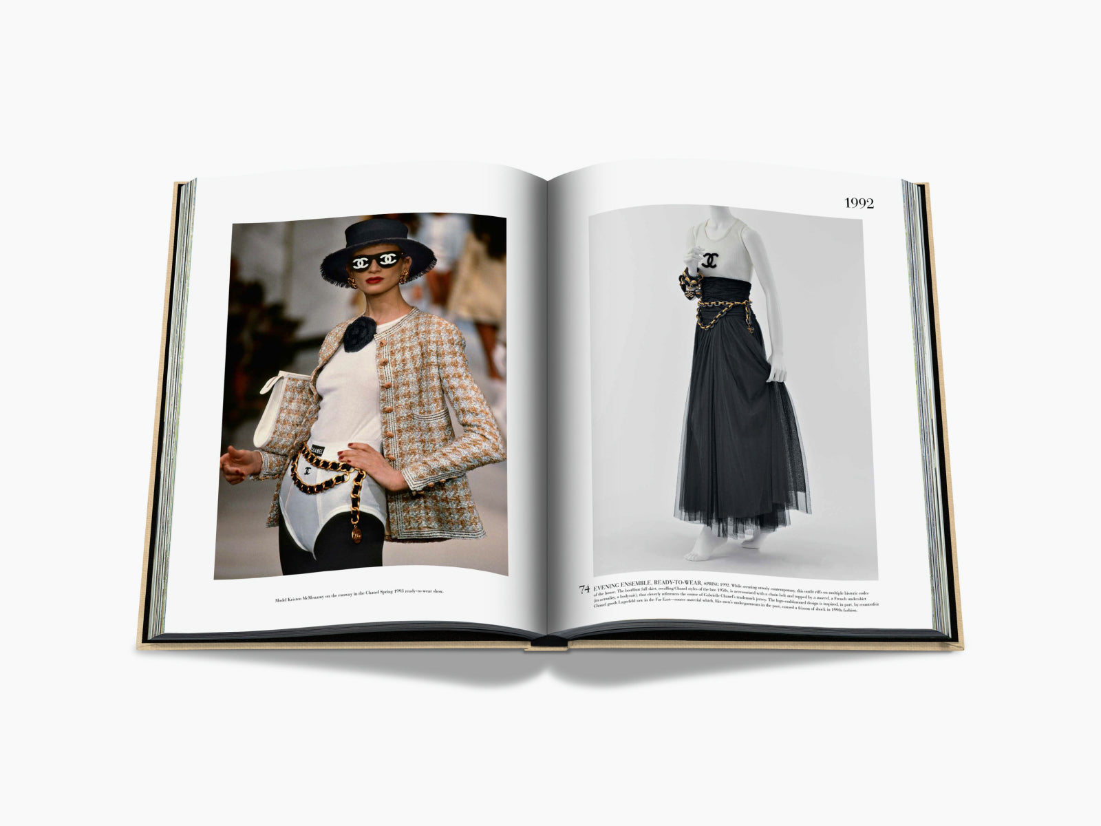 Chanel Impossible Collection open to 1992 showing tweed suit with hat on the left and a black layered skirt on the right.