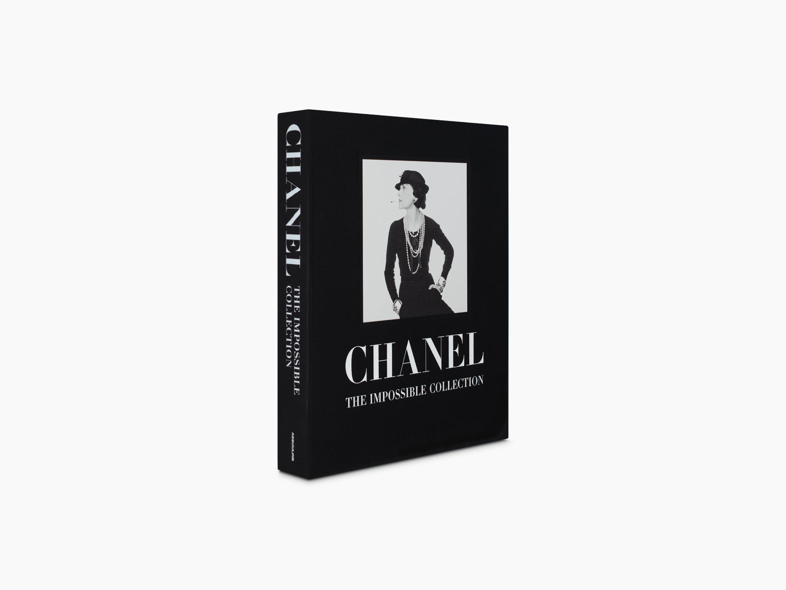 Chanel The Impossible Collection hardcover with a black cover and a framed black and white portrait at center