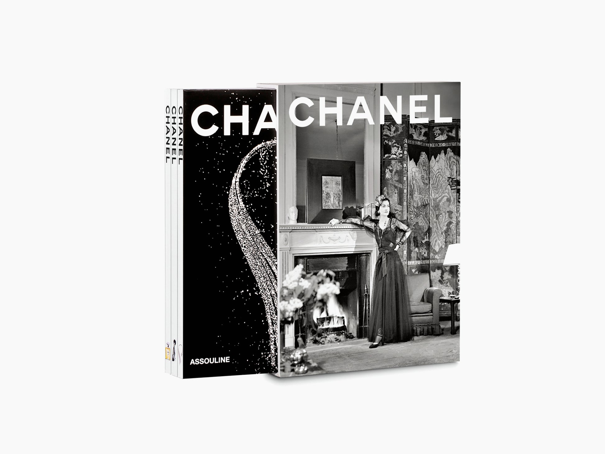 Chanel three book slipcase set displayed with bold CHANEL across the covers and three slim spines
