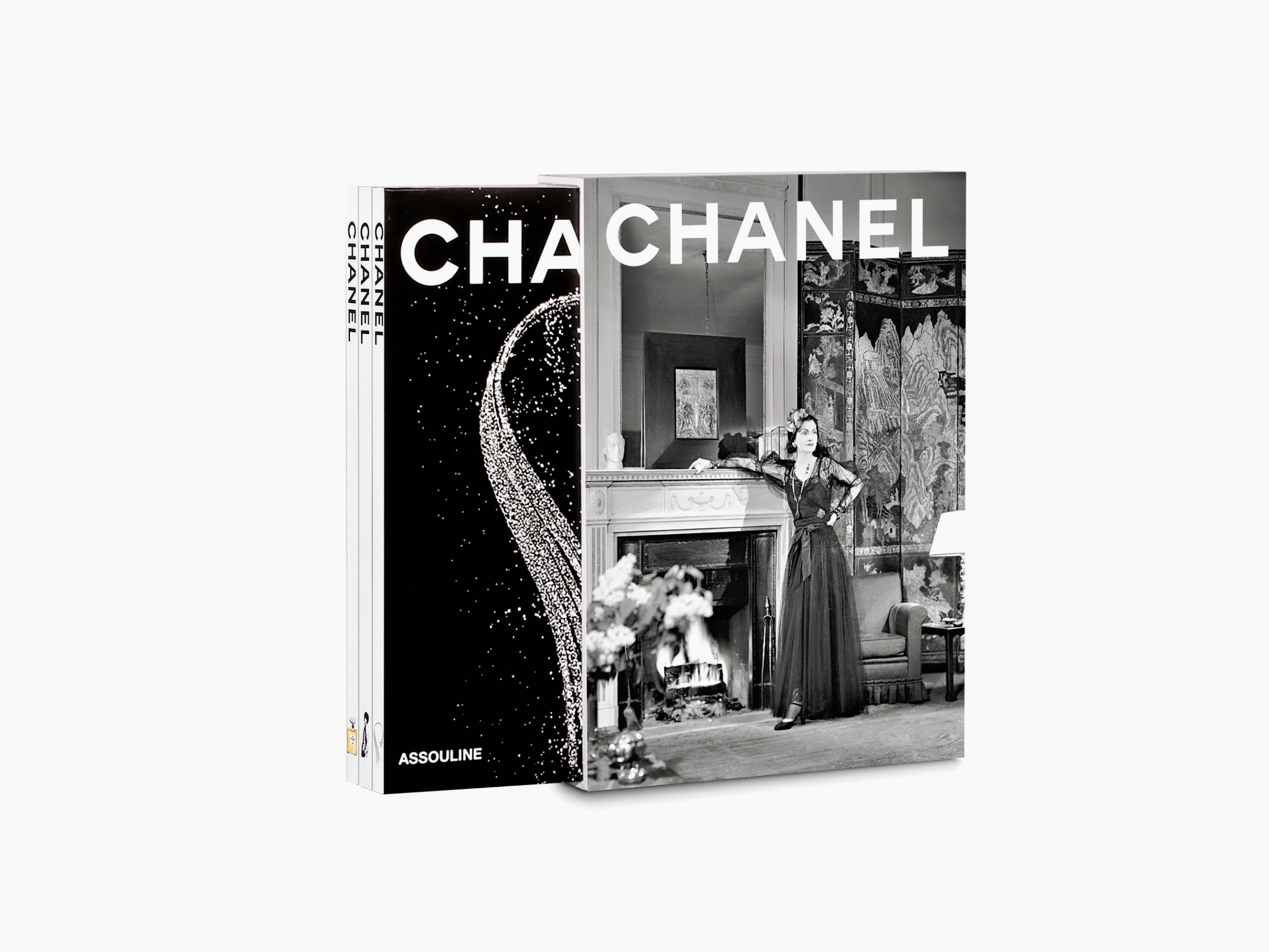 Chanel three book slipcase set displayed with bold CHANEL across the covers and three slim spines