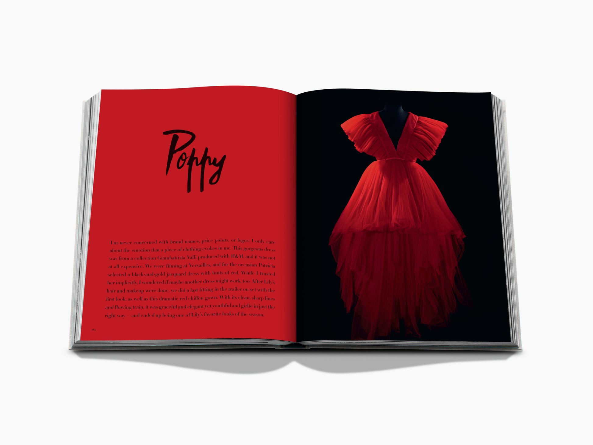 Left page features a bold red panel with Poppy script; right page shows a dramatic red gown against a black backdrop.