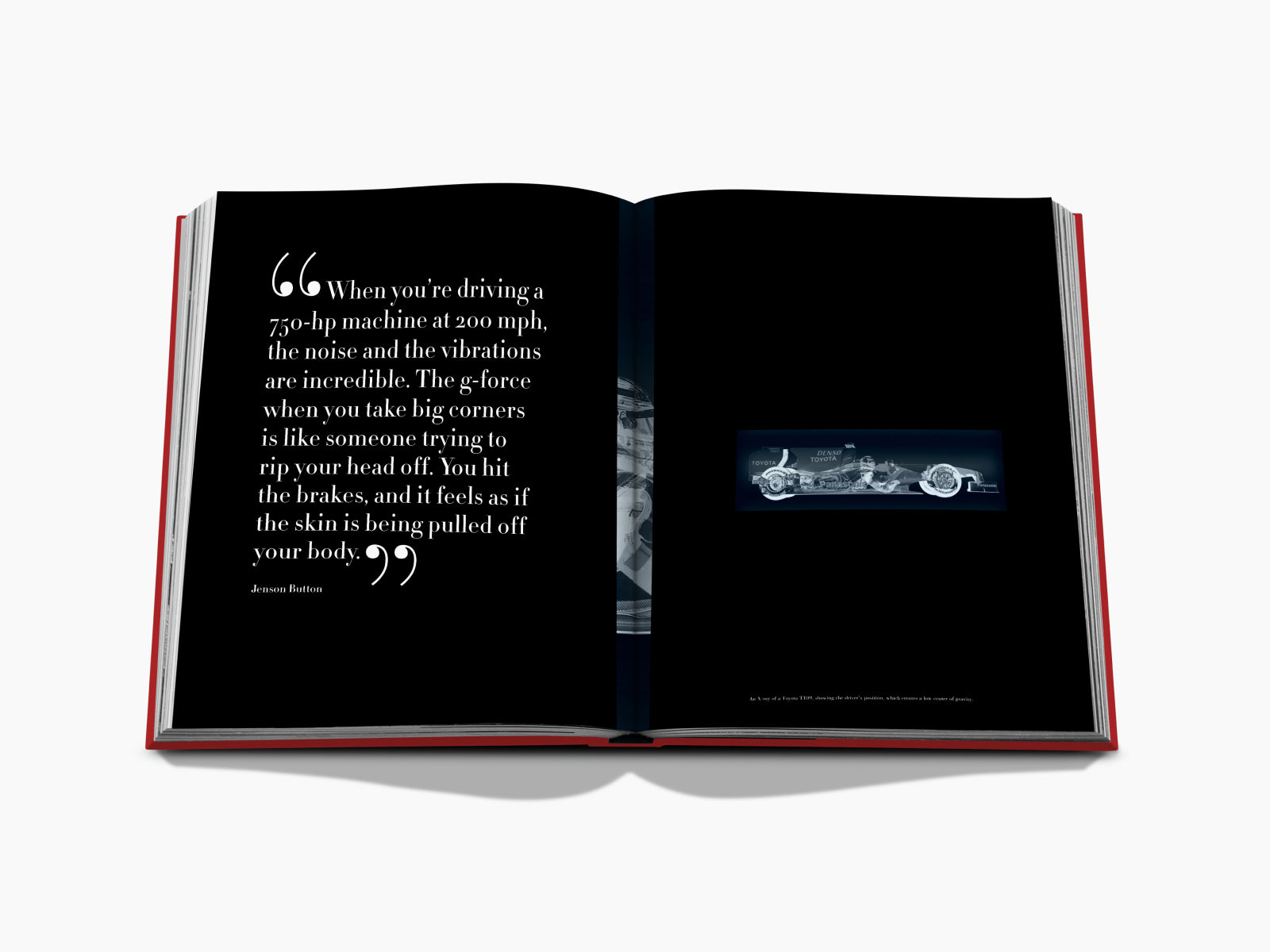 Open book spread with a bold white quotation on a black page and a small Formula 1 car image on the right