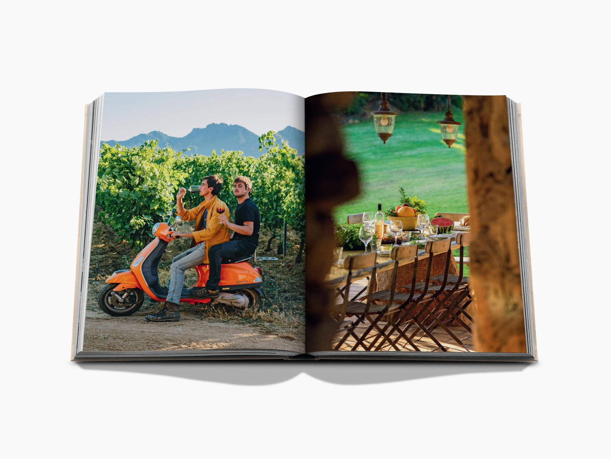 Open wine travel book with a vineyard scene of two men on an orange scooter on the left and a Corsica map and article on the right.