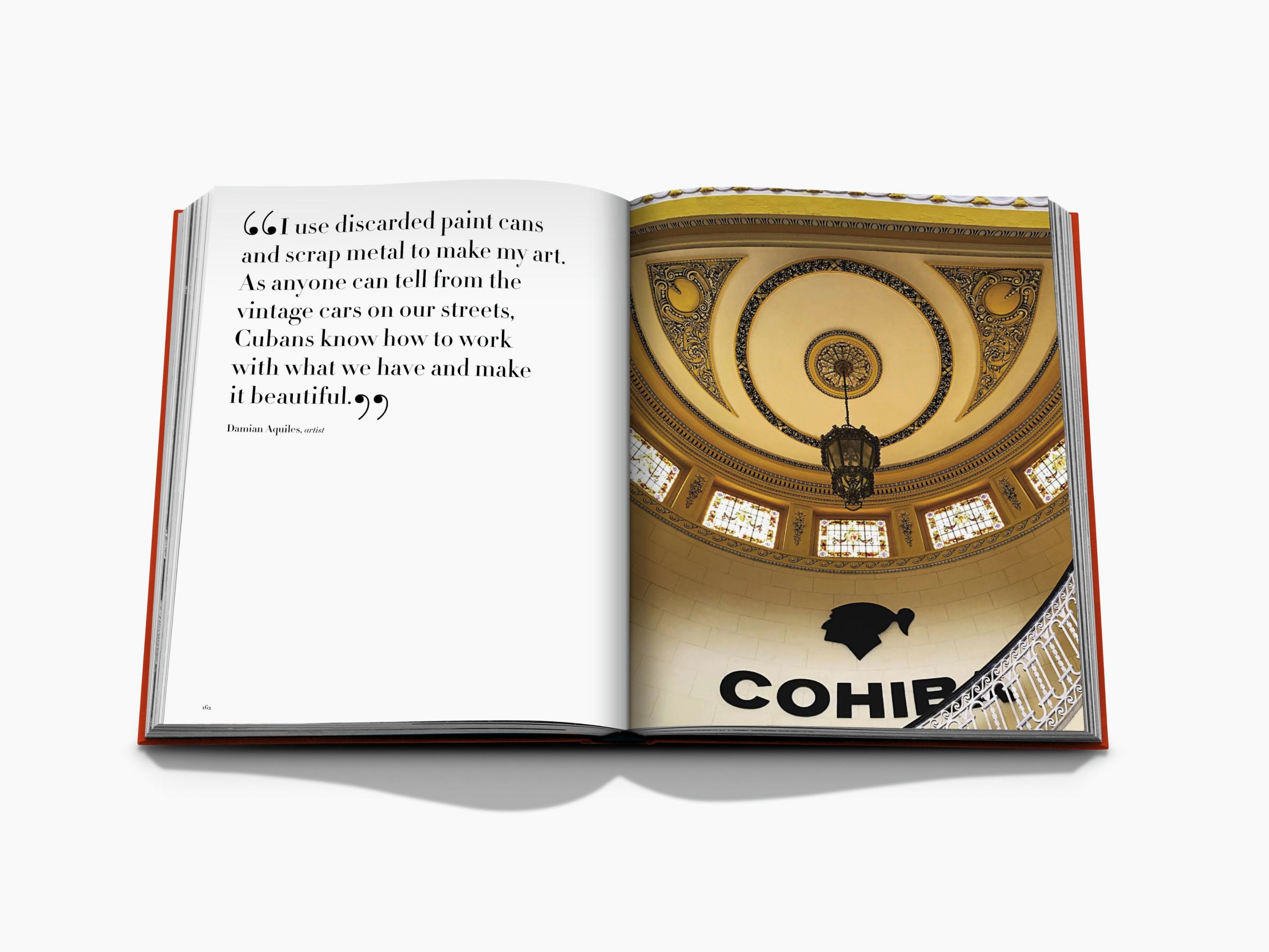 Two page spread with a large quote on the left and an ornate domed ceiling with a hanging lantern on the right, visible Cohiba sign