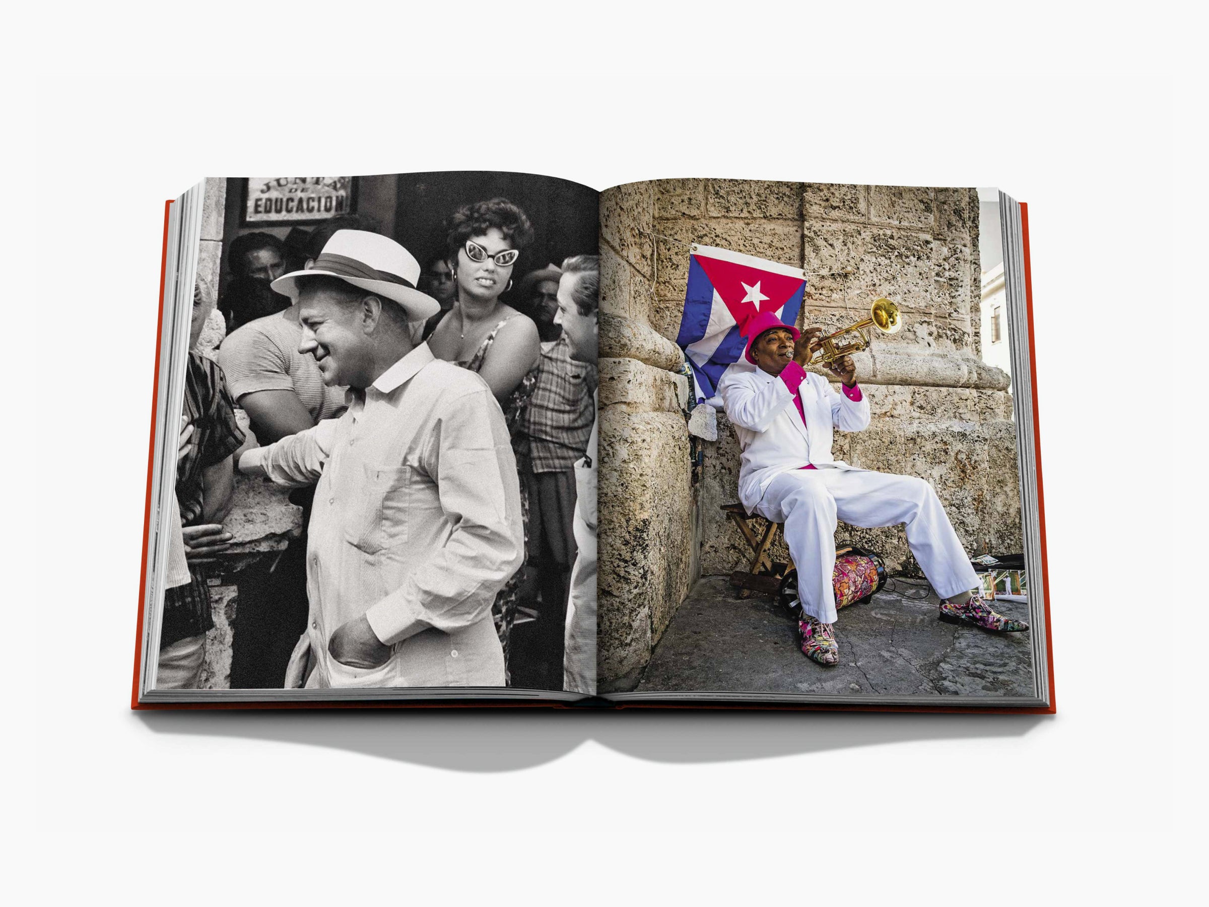 Two page spread showing a black and white crowd on the left and a trumpeter with a Cuban flag on the right.
