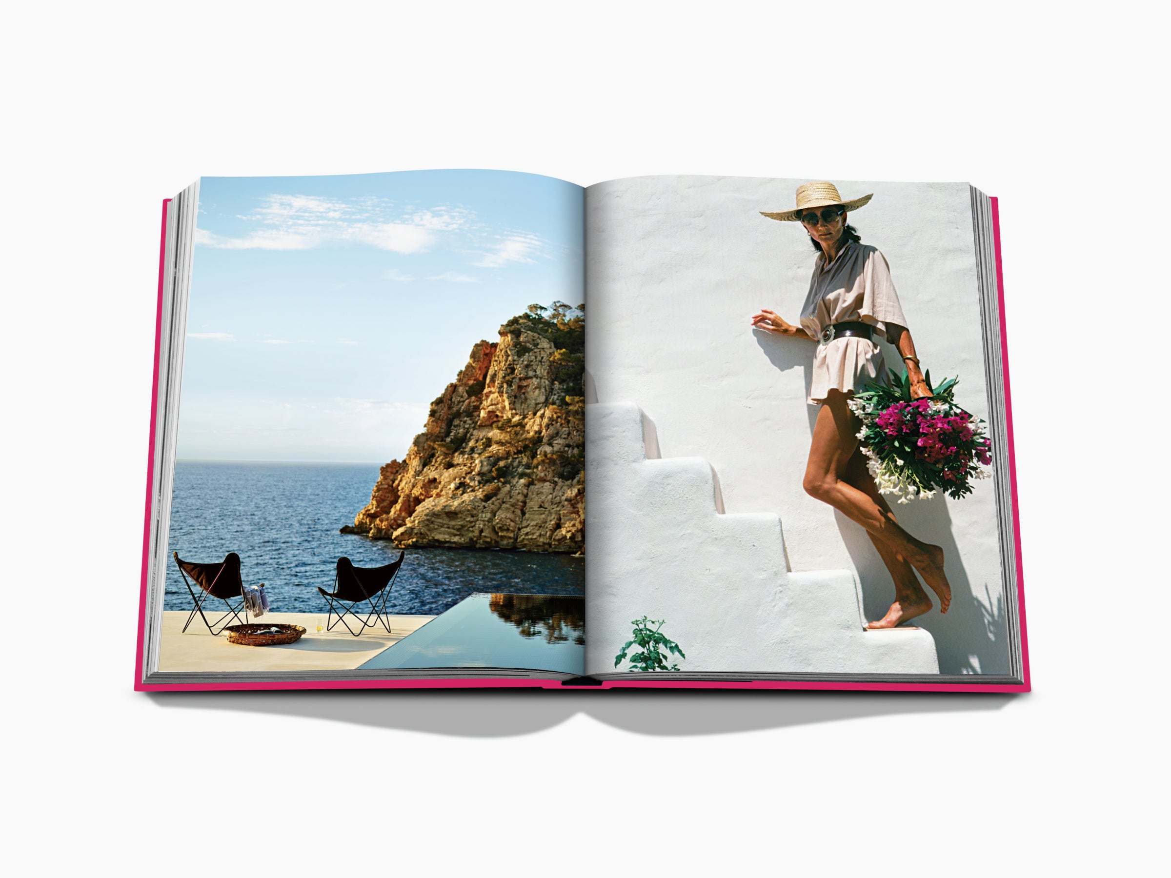 Left page shows a coastal cliff and lounge chairs by the sea; right page a stylish woman in a light outfit with a hat carrying a bouquet on white stairs