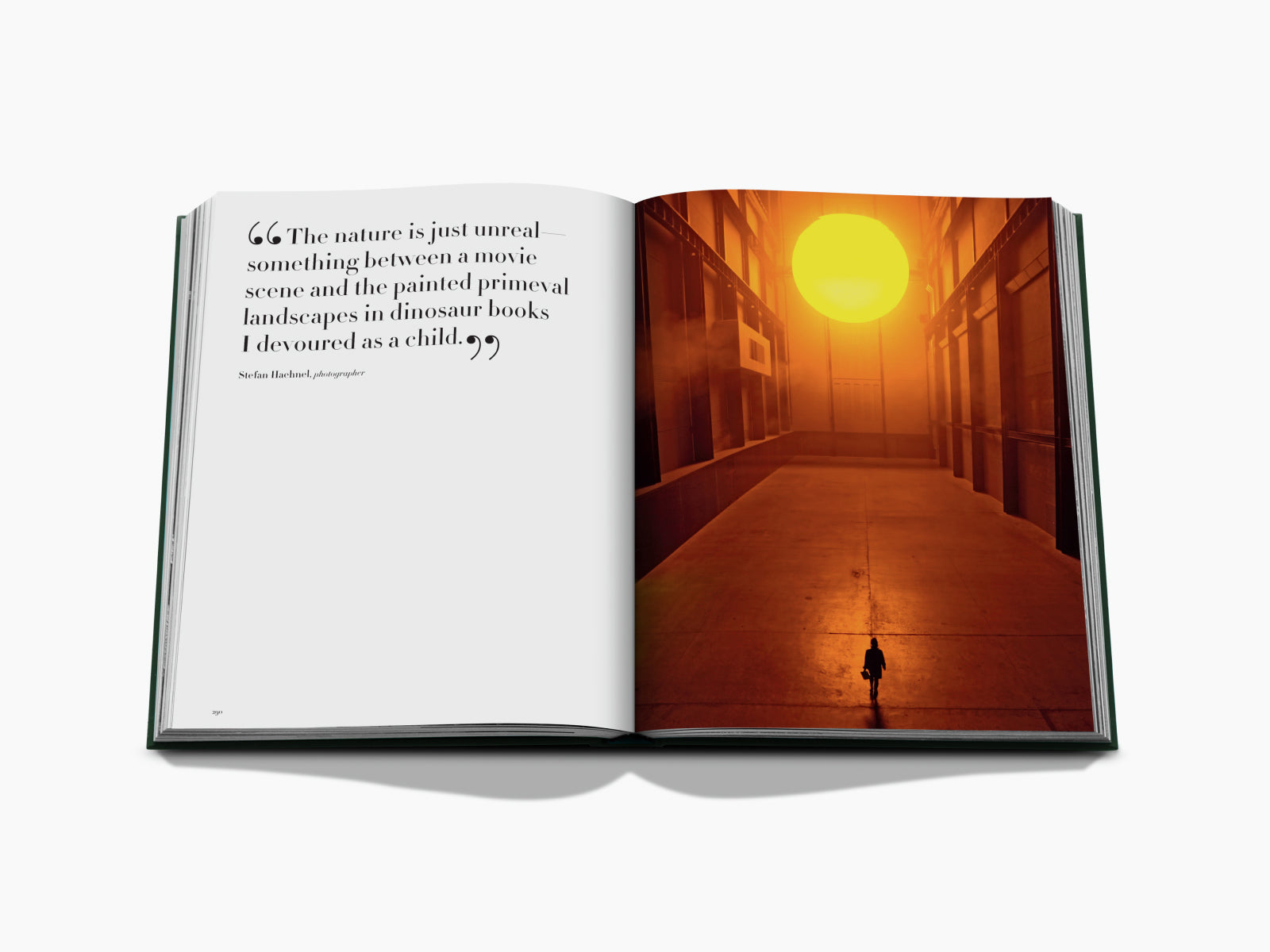 Two page spread from Iceland Epic with a quote on the left and an orange lit canyon with a lone figure on the right