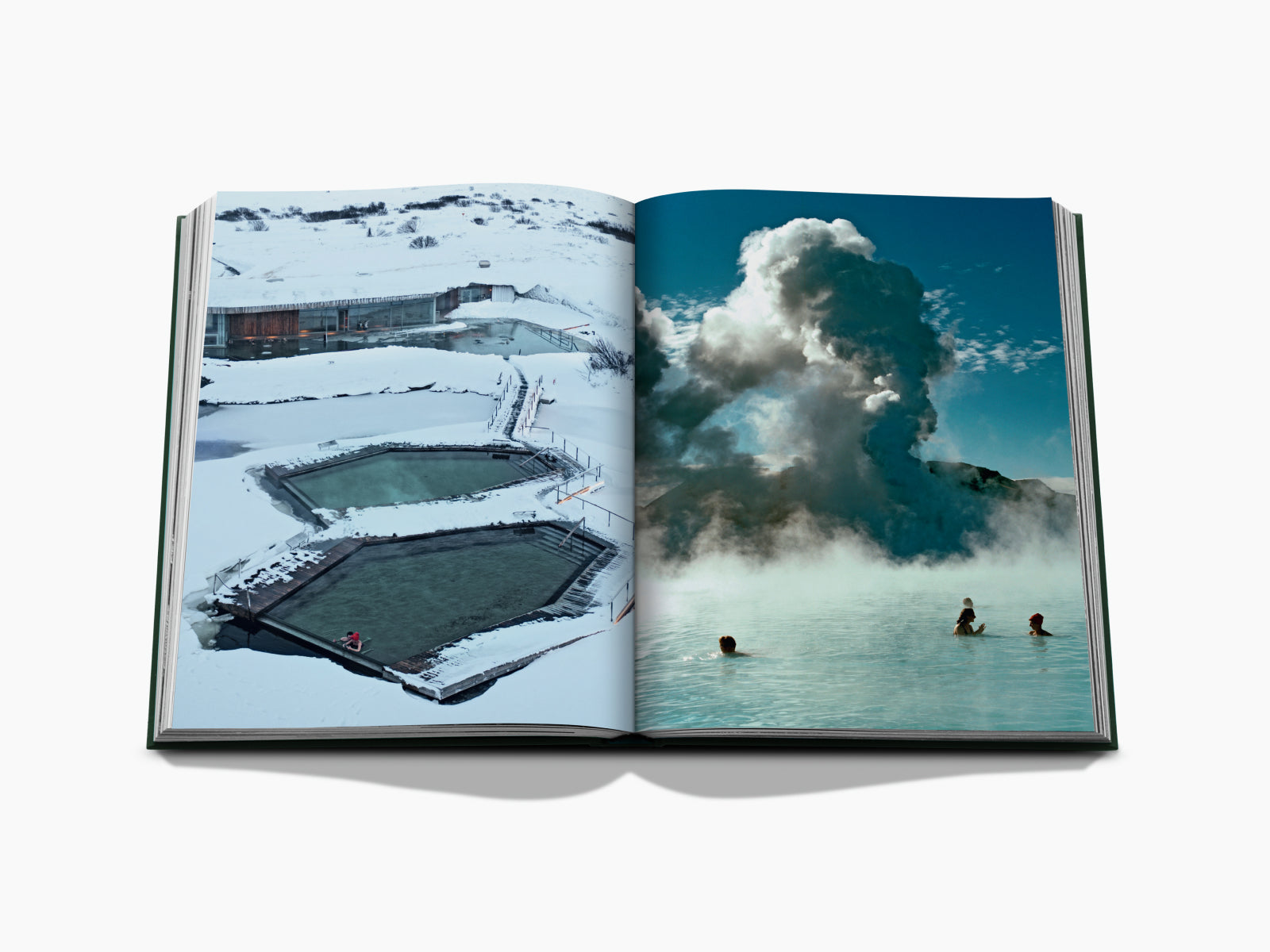 Open Iceland travel book spread with snow-covered geothermal pools on the left and a steaming hot spring with swimmers on the right.