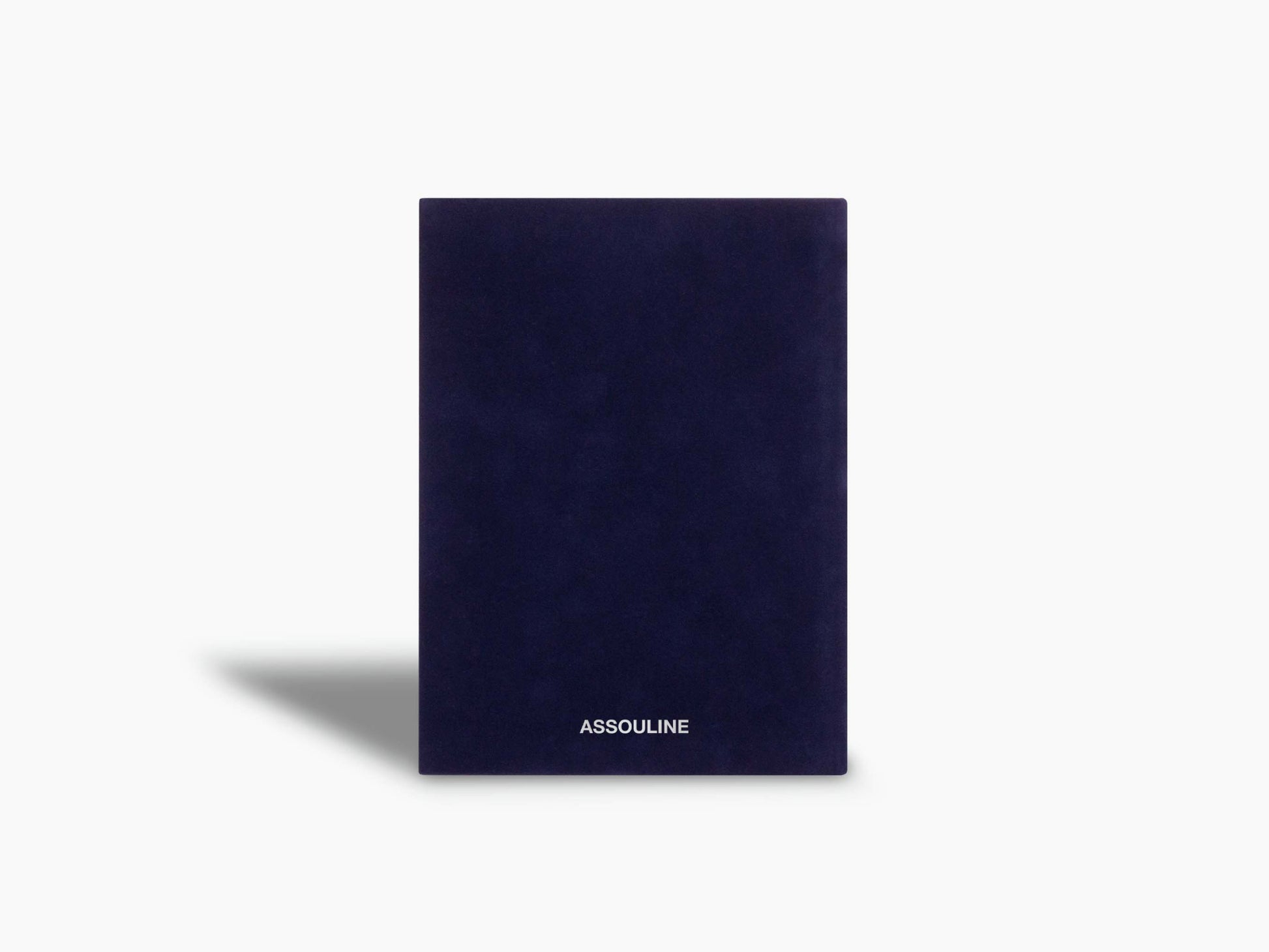 Navy Assouline notebook viewed from front with logo at bottom.