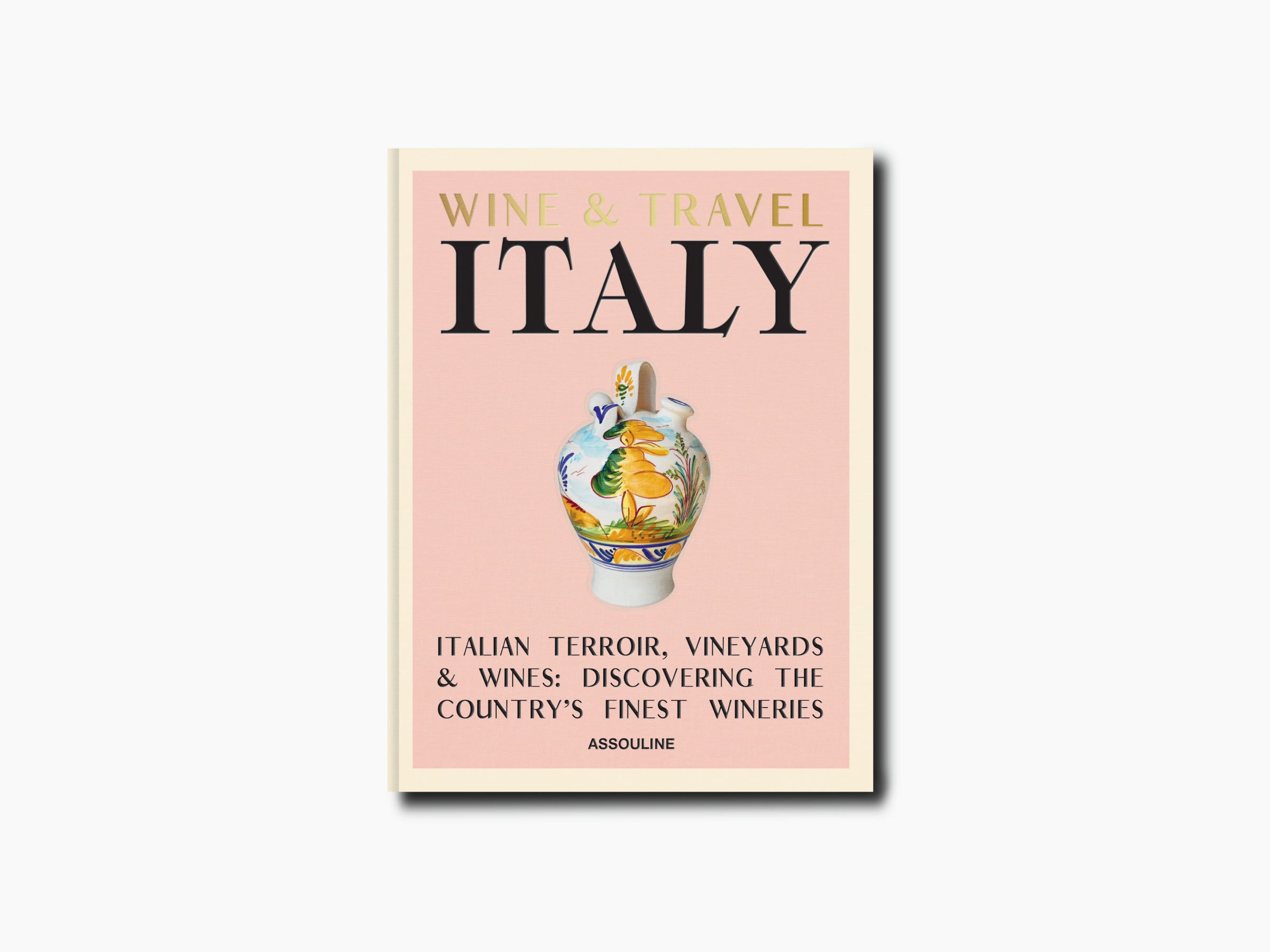 Wine & Travel Italy cover showing a decorative ceramic vase on a pale pink background.