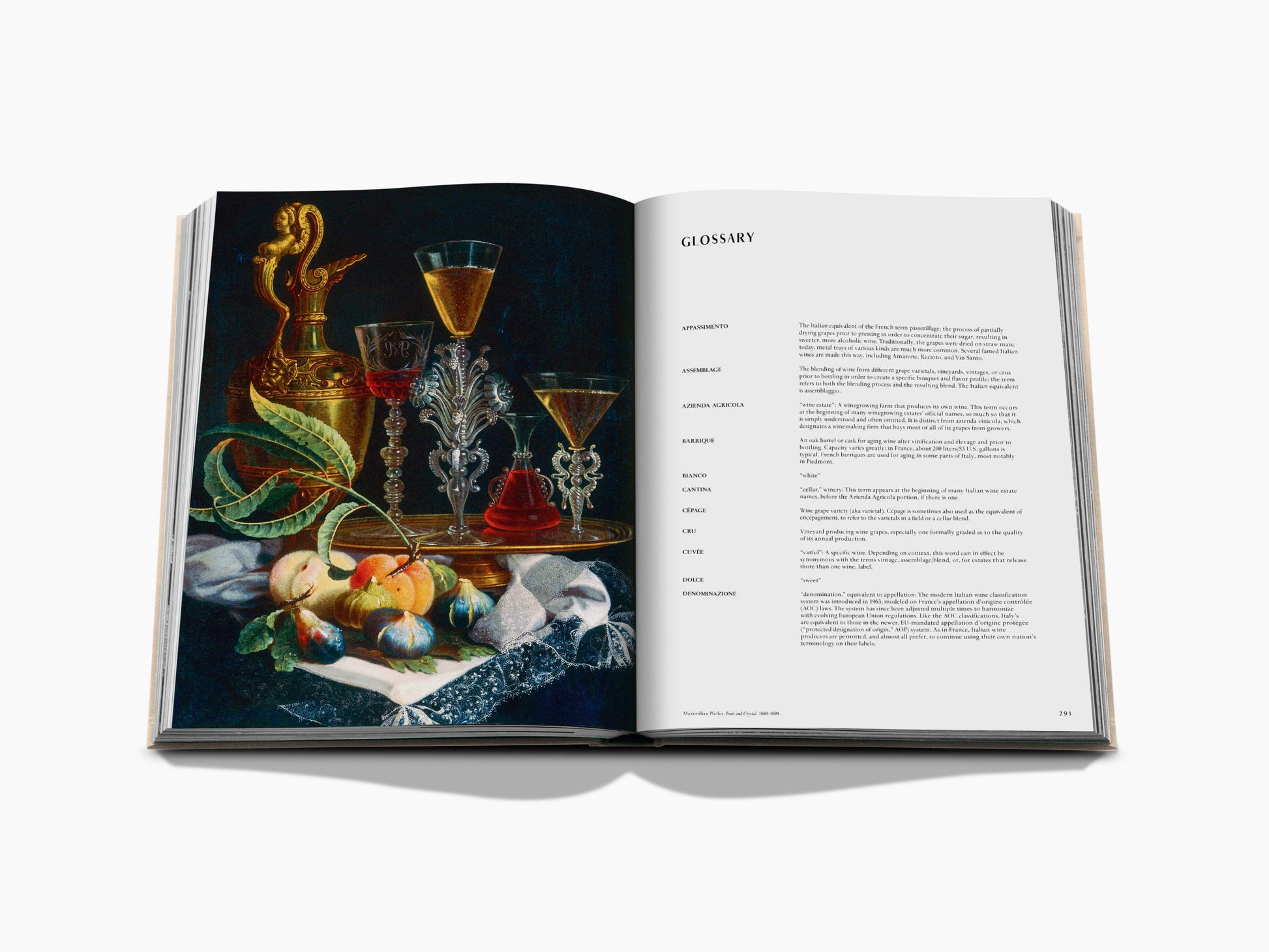 Glossary spread with a still life of glassware on the left and wine terms on the right