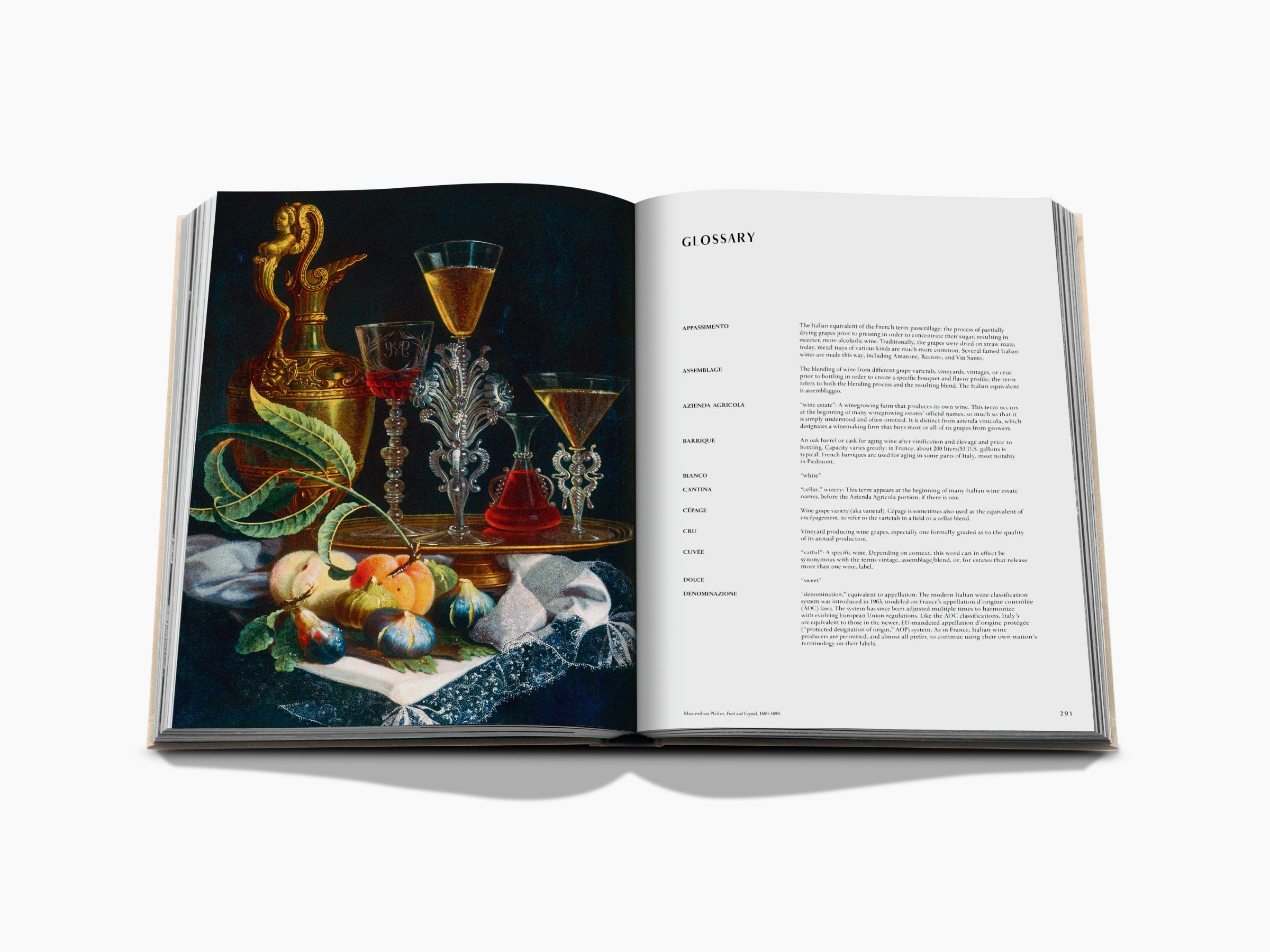 Glossary spread with a still life of glassware on the left and wine terms on the right