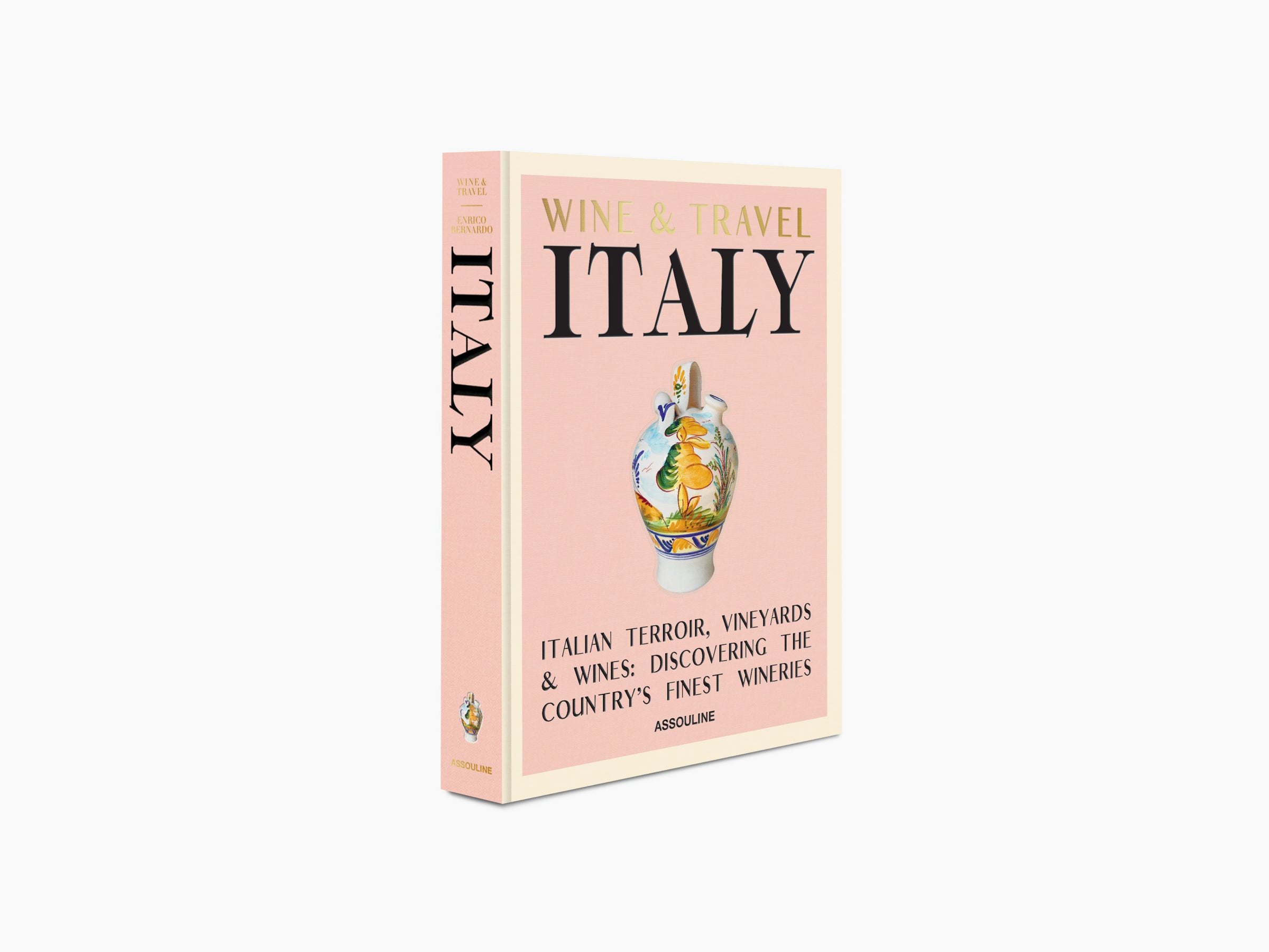 Wine & Travel Italy book cover with large ITALY lettering and a decorative ceramic vase on a pink background.