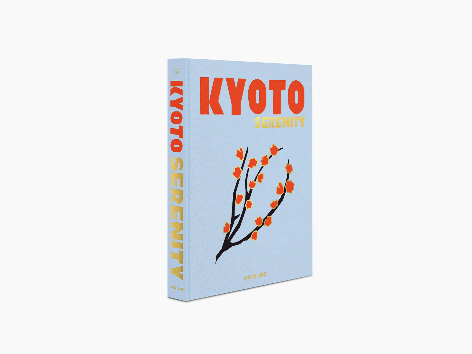 Angled view of Kyoto Serenity book showing the spine with vertical gold title and a blue cover with orange blossom artwork