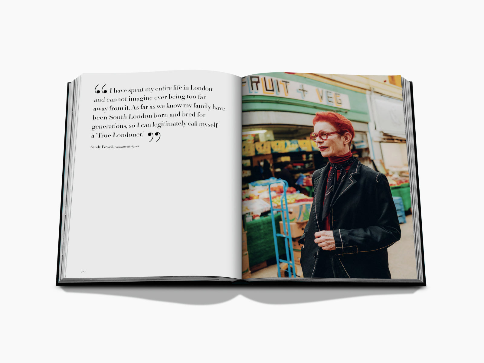 Open book spread with a quote on the left page and a portrait of a man in a shop filled with dishes on the right.