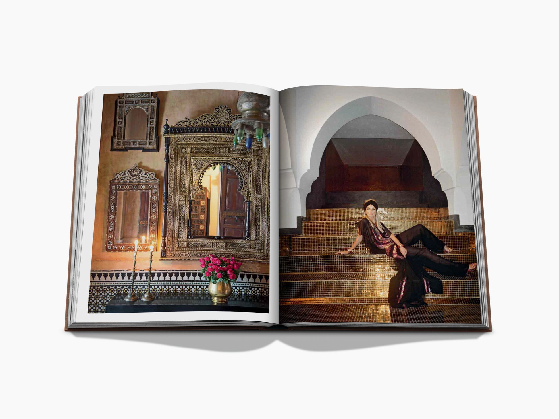 Open Marrakech Flair spread featuring an ornate Moroccan doorway with candles on the left and a woman posed on gold mosaic stairs under an arch on the right.