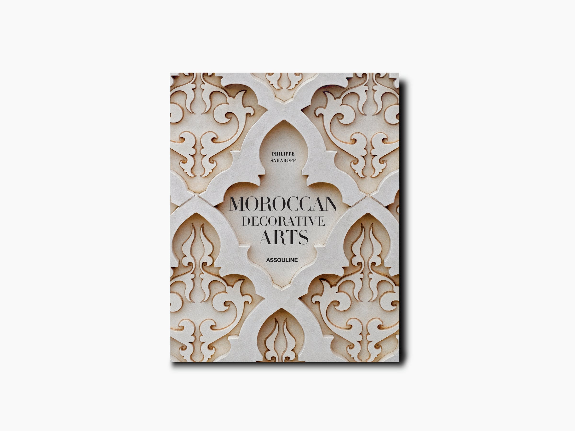 Moroccan Decorative Arts book cover with intricate cream plasterwork and a colorful mosaic strip along the left edge.