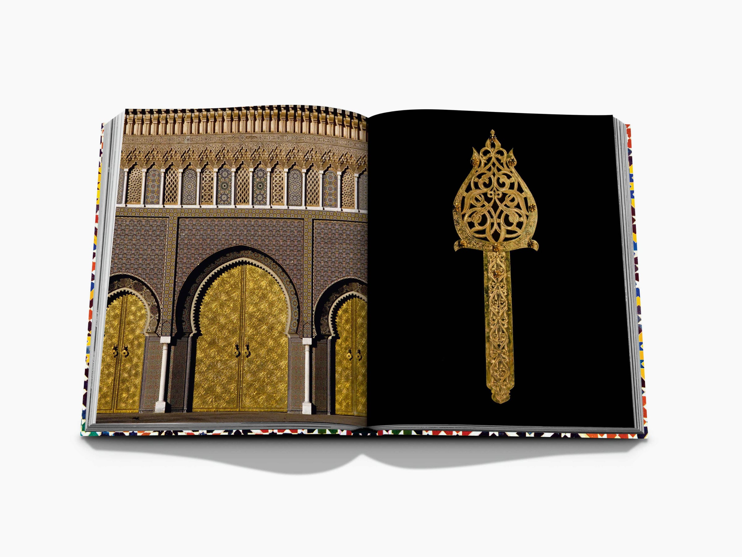 Open spread from Moroccan Decorative Arts with ornate arched doorways on the left and a gold ornamental key against black on the right.