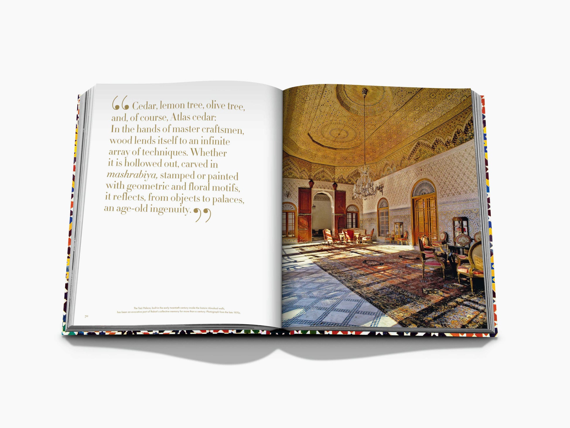 Opulent Moroccan palace interior with gilded ceiling, chandelier, and patterned floor tiles.