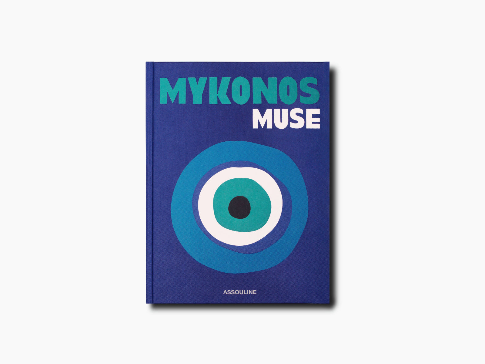 Blue Mykonos Muse travel book cover with bold title and circular eye design.