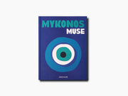 Blue Mykonos Muse travel book cover with bold title and circular eye design.