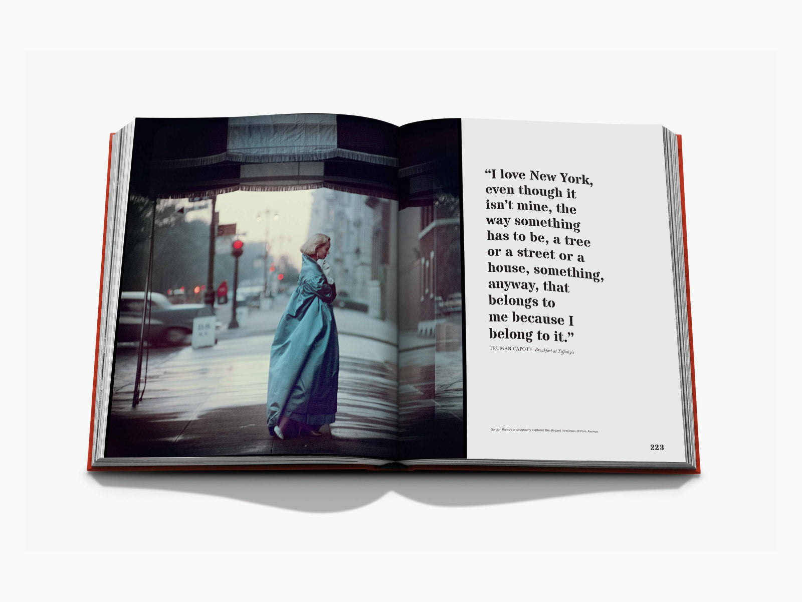 Left page shows a woman in a blue coat on a city sidewalk, right page features a large quote about loving New York.