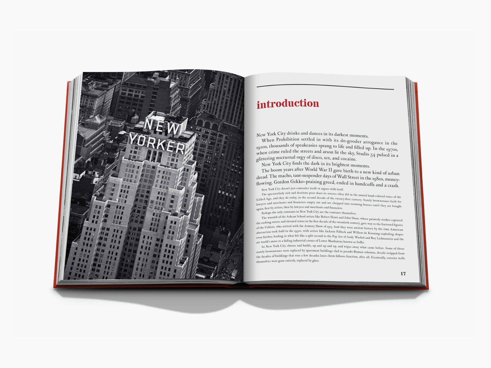 Open book with a grayscale New York City photo on the left and introduction text with a red heading on the right