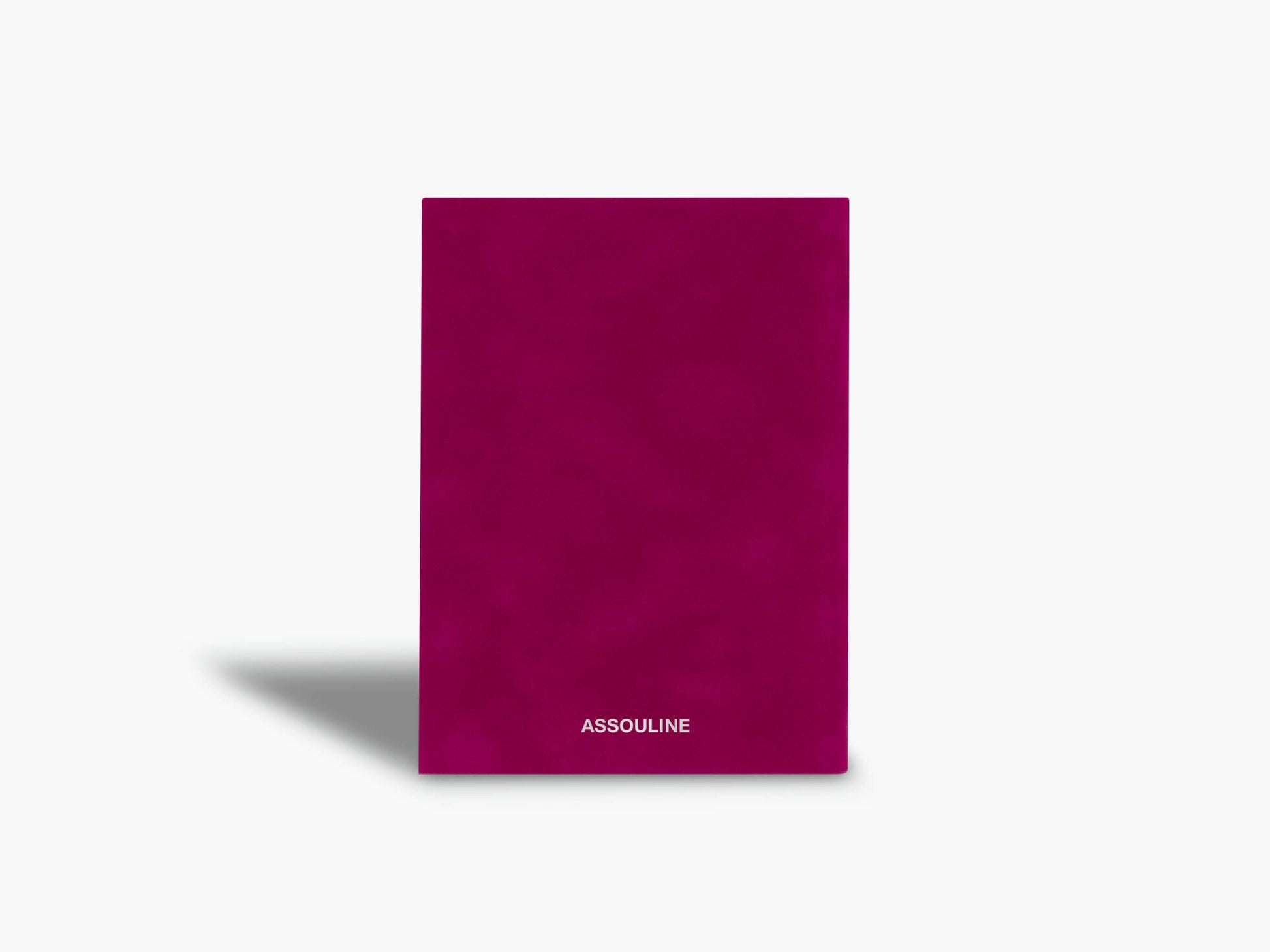 Magenta Assouline Obsessions notebook shown front on with branding at the bottom