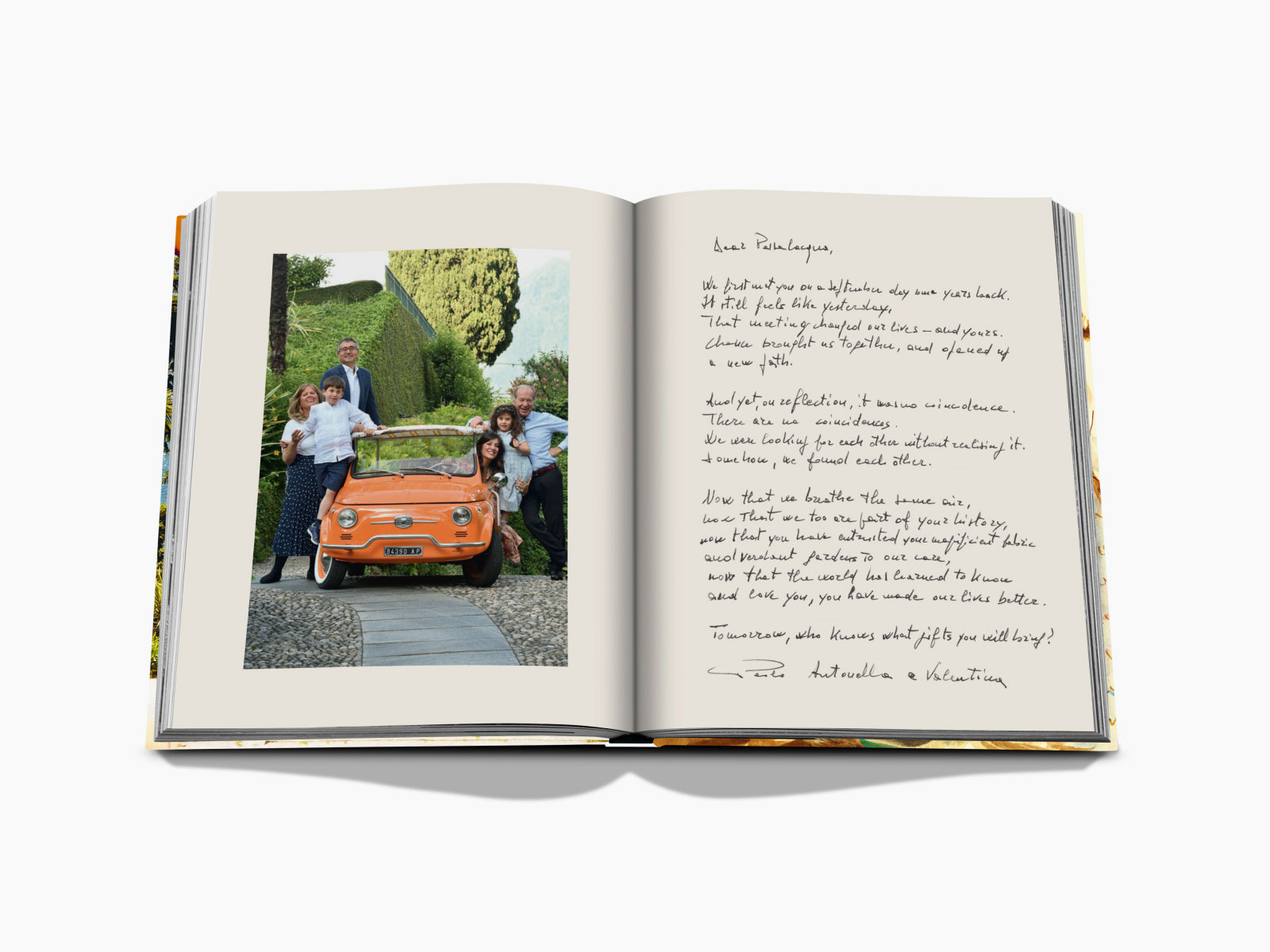 Open Passalacqua book spread with a family portrait and an orange vintage car on a stone driveway on the left and a handwritten note on the right