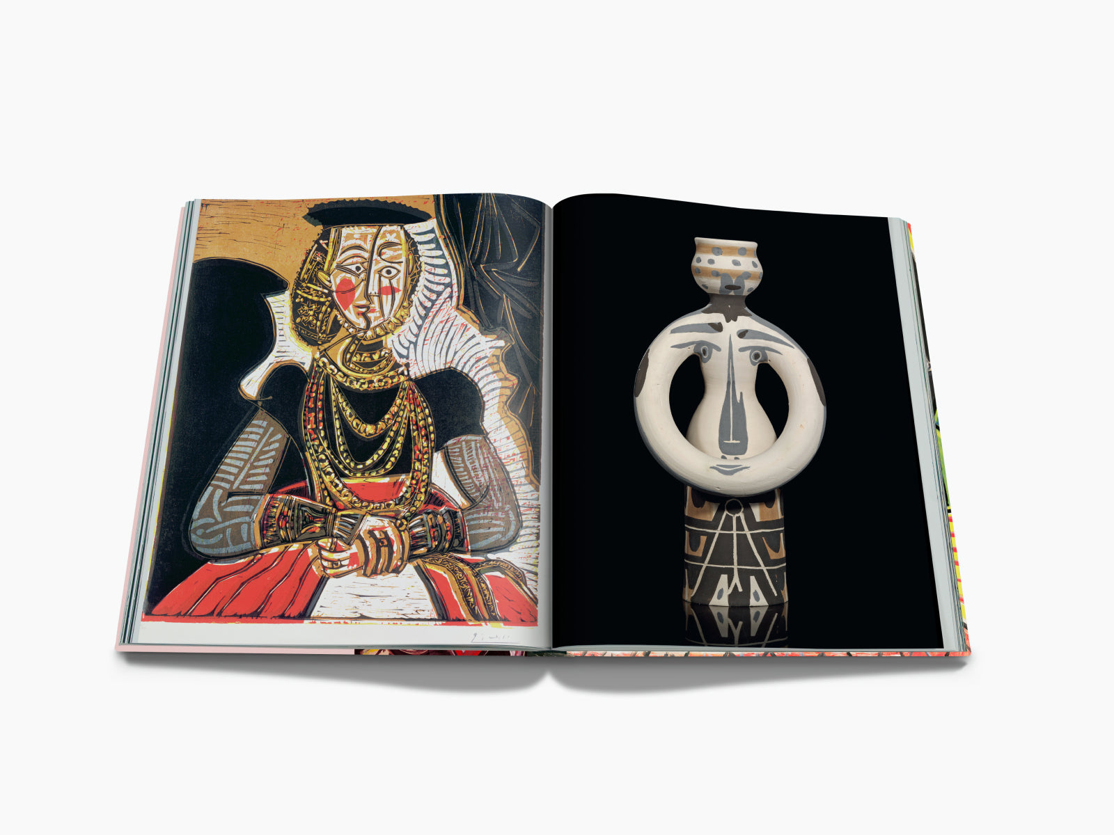 Two page spread with a colorful Picasso portrait on the left and a ceramic sculpture on the right against a black background