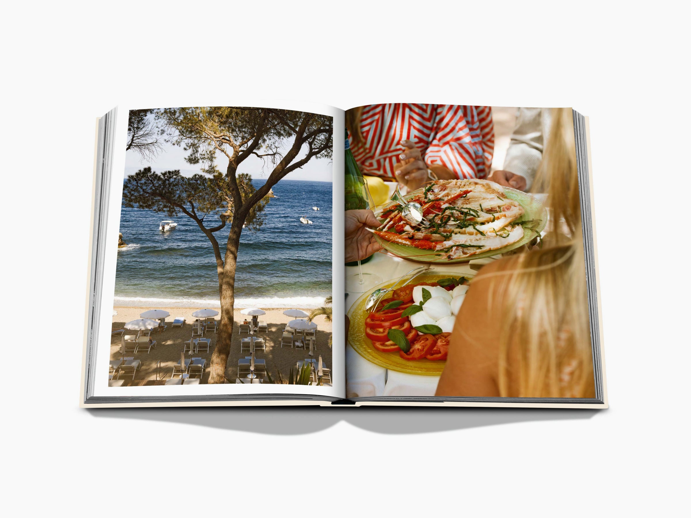 Open book spread featuring a seaside tree and beach chairs on the left and a plate of seafood pasta on the right.