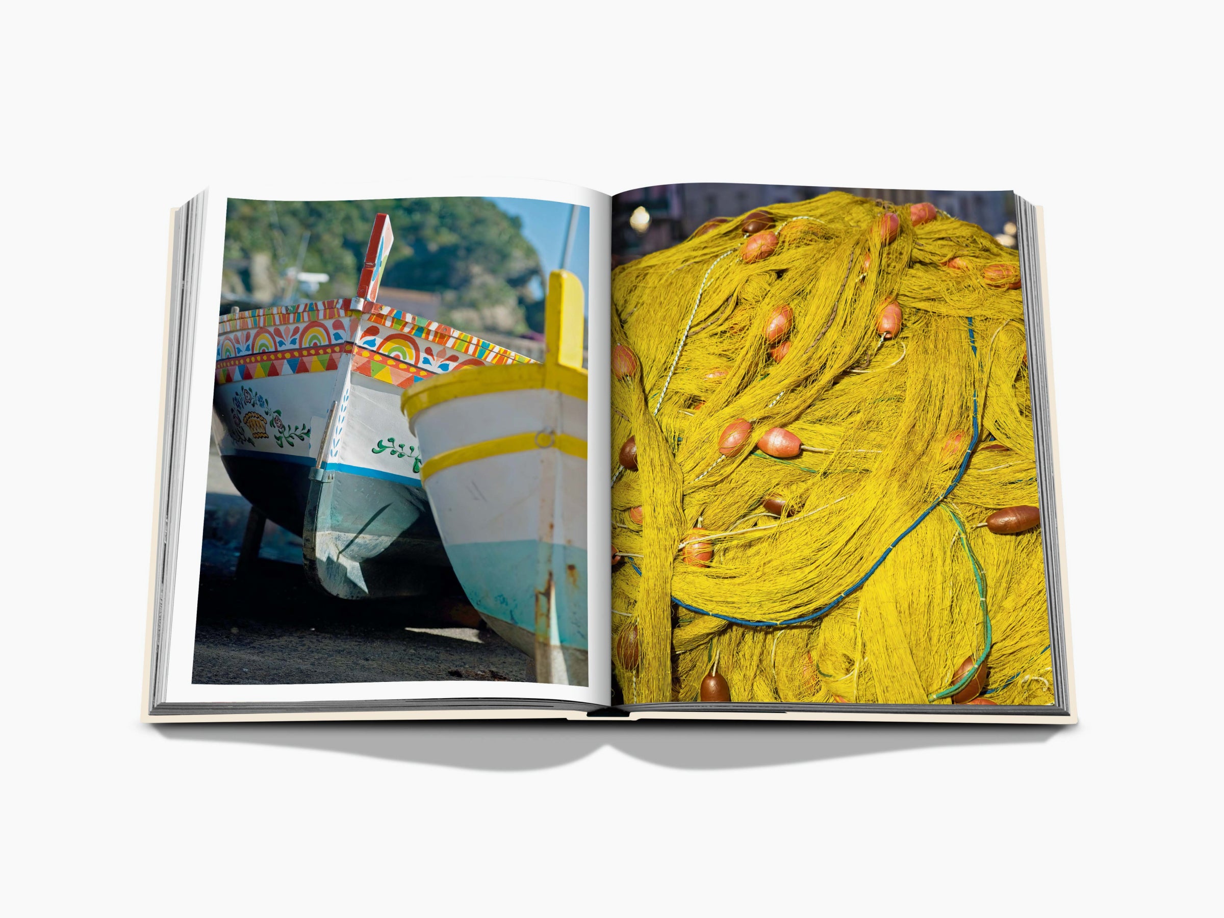 Colorful hand painted fishing boats on a dock by the sea