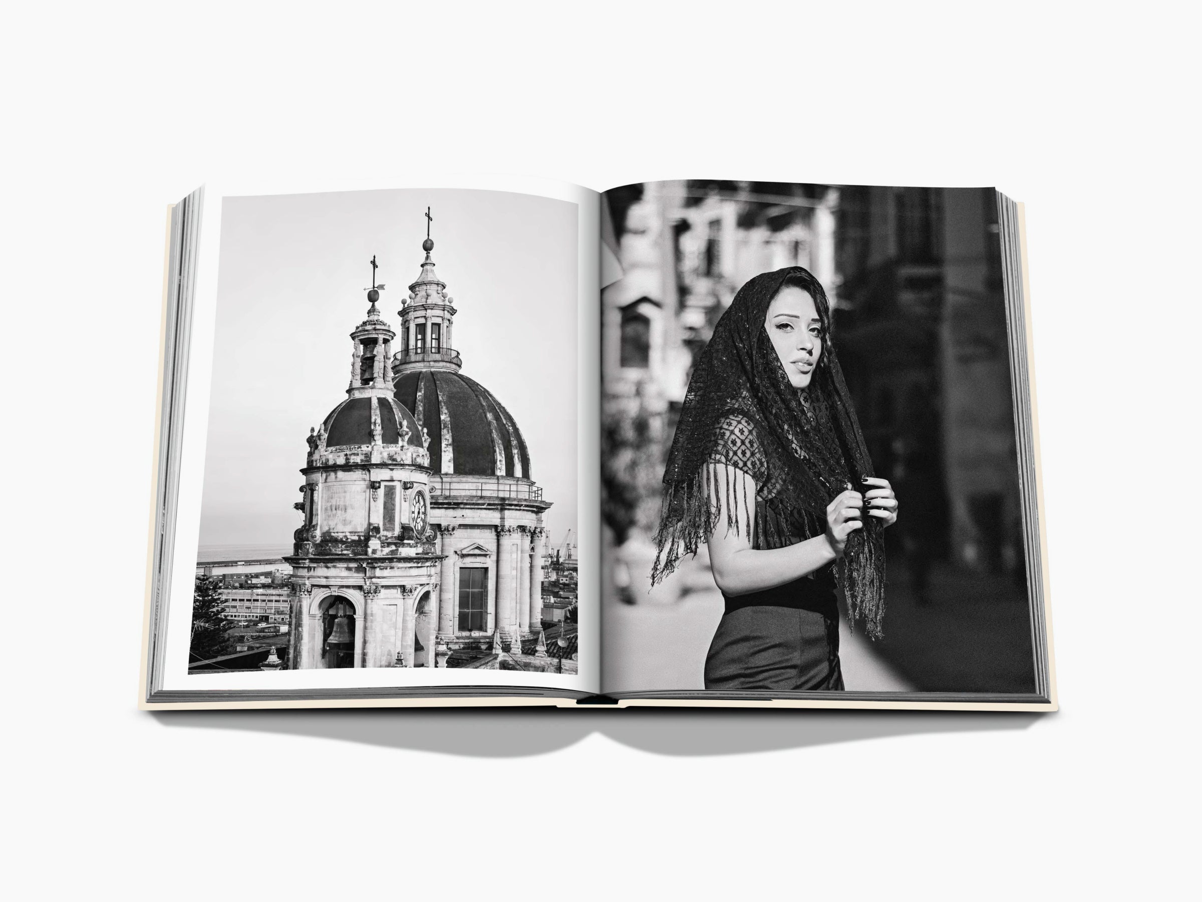 Open Sicily Honor spread with a domed church on the left and a woman in a lace headscarf on the right.