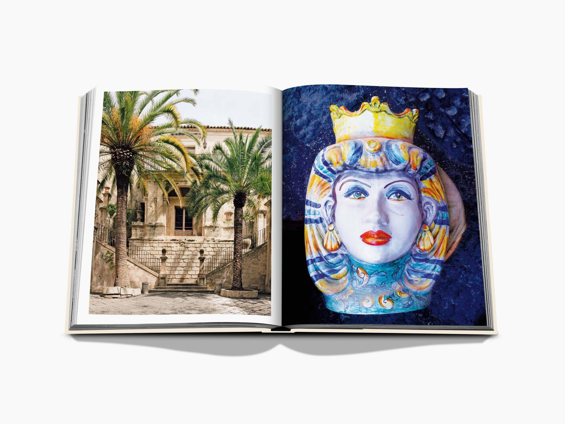Open book spread showing a Sicilian courtyard with palm trees on the left and a colorful ceramic vase on the right.
