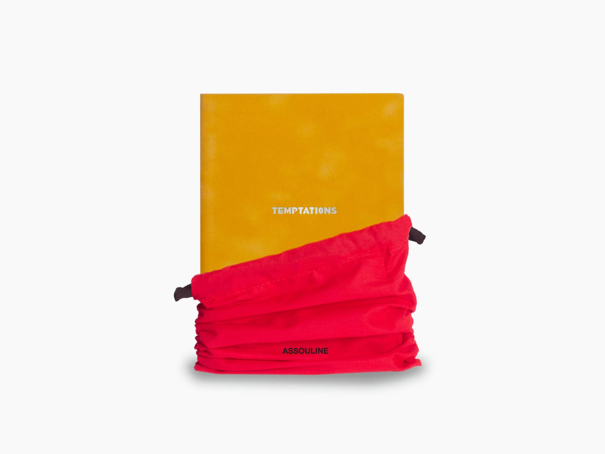 Open orange Temptations notebook with a red elastic closure and lined pages