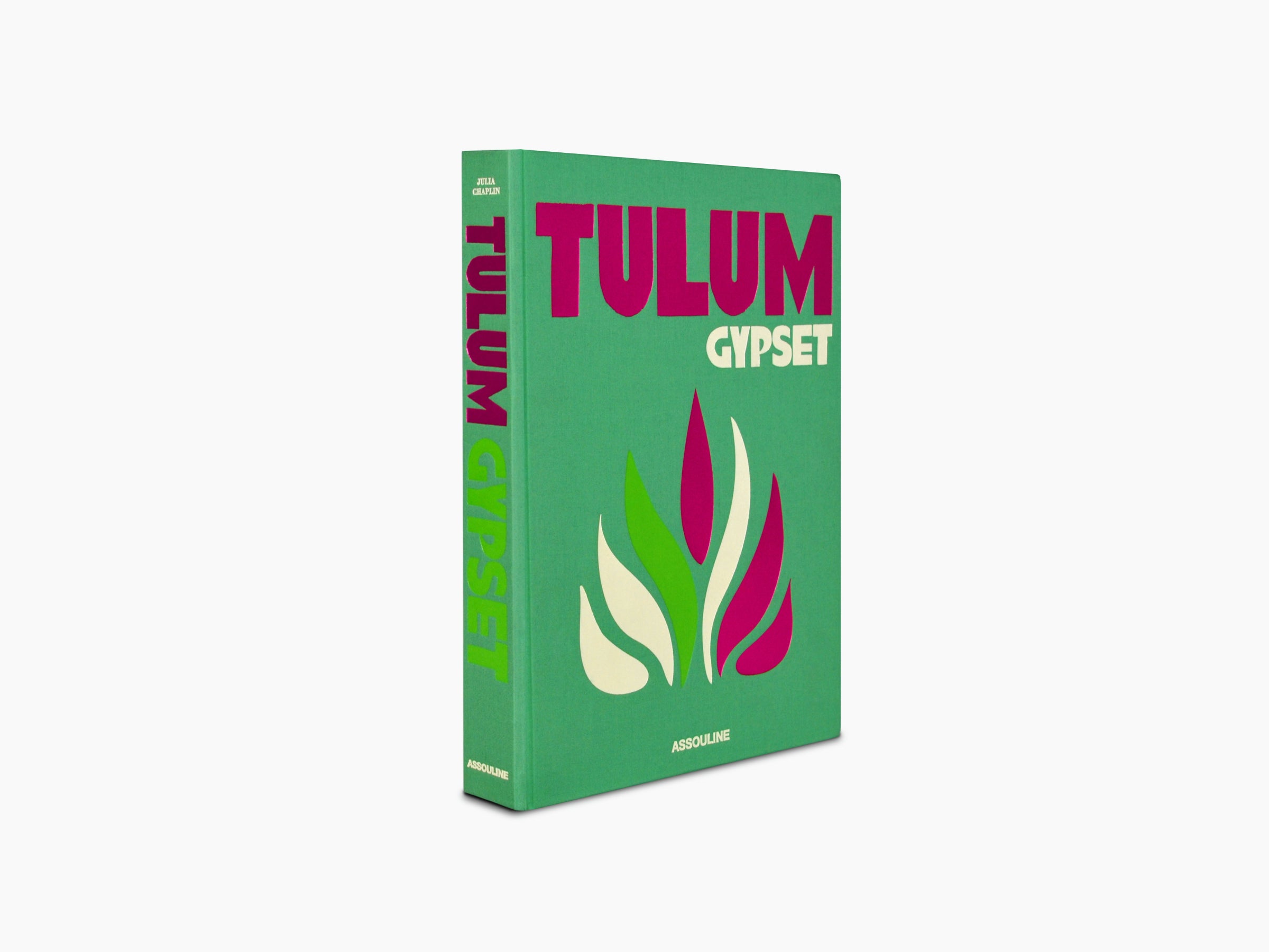 Three quarter view of green Tulum Gypset book showing magenta spine text and cover artwork