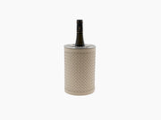 Menfi Handwoven Bottle Cooler with ivory leather weave and stainless interior surrounding a wine bottle.