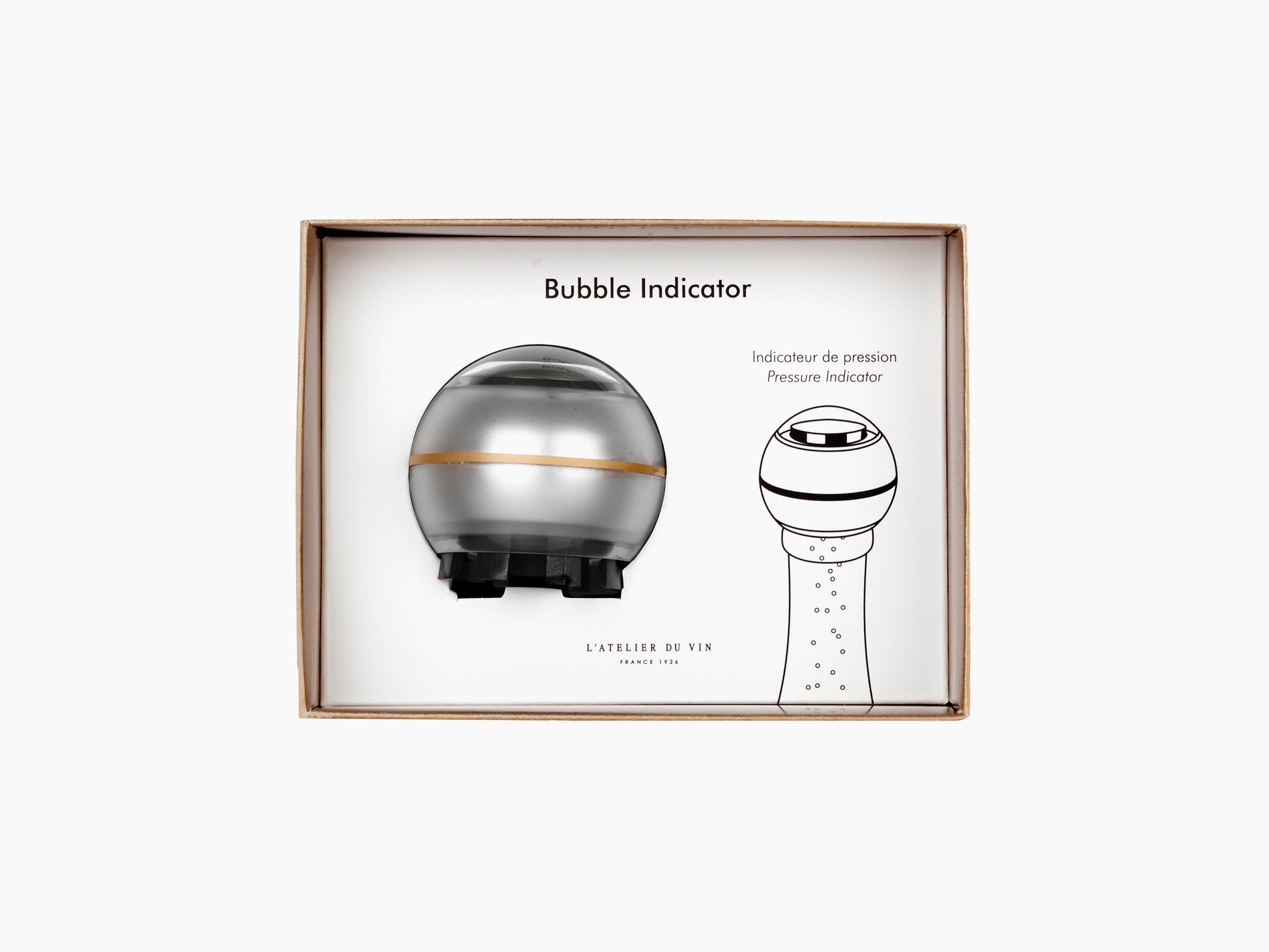 Bubble Indicator pressure device for sparkling wine shown in its box with the device and diagram.