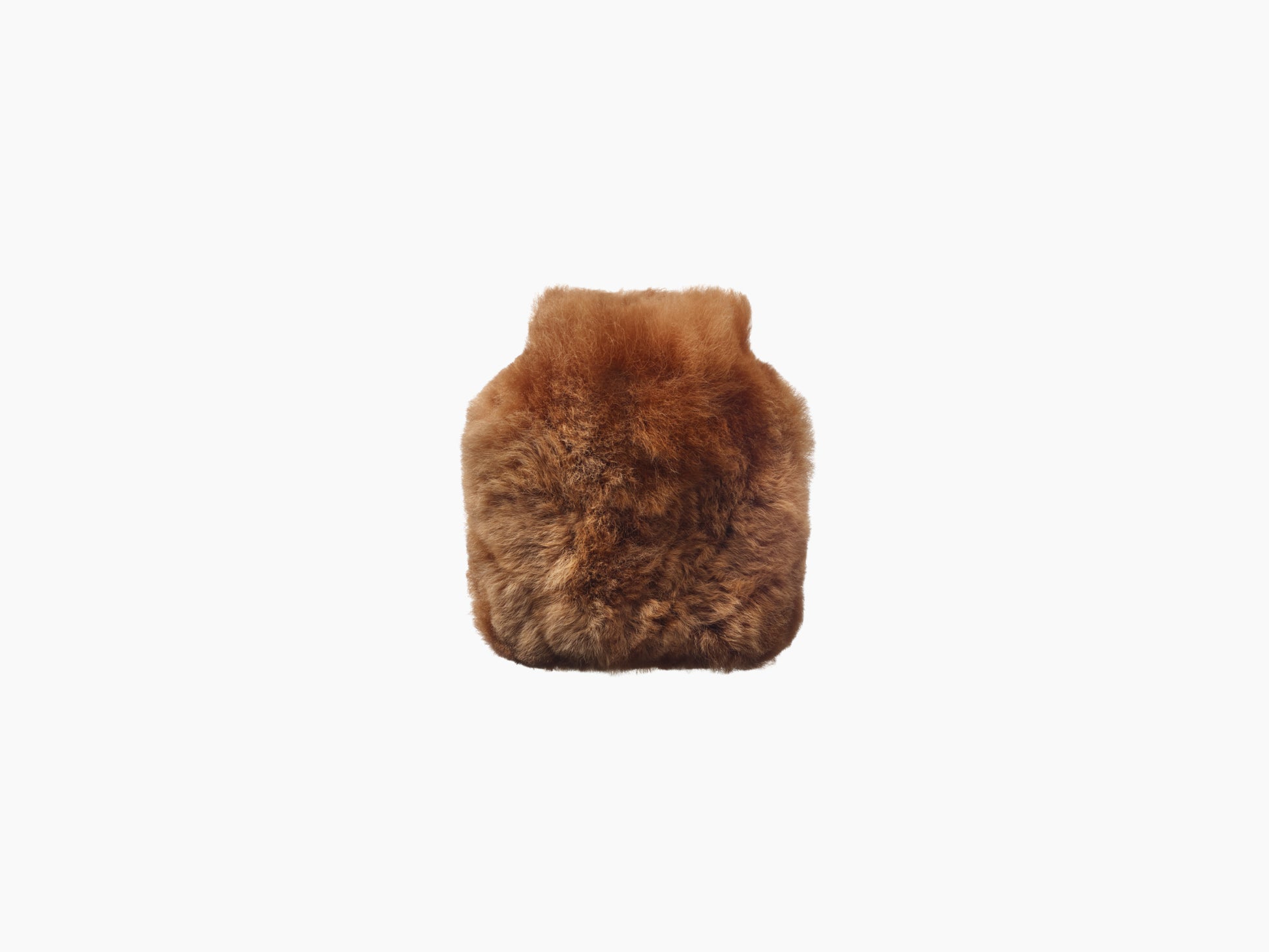 Brown plush alpaca fur hot water bottle cover with soft rounded edges.