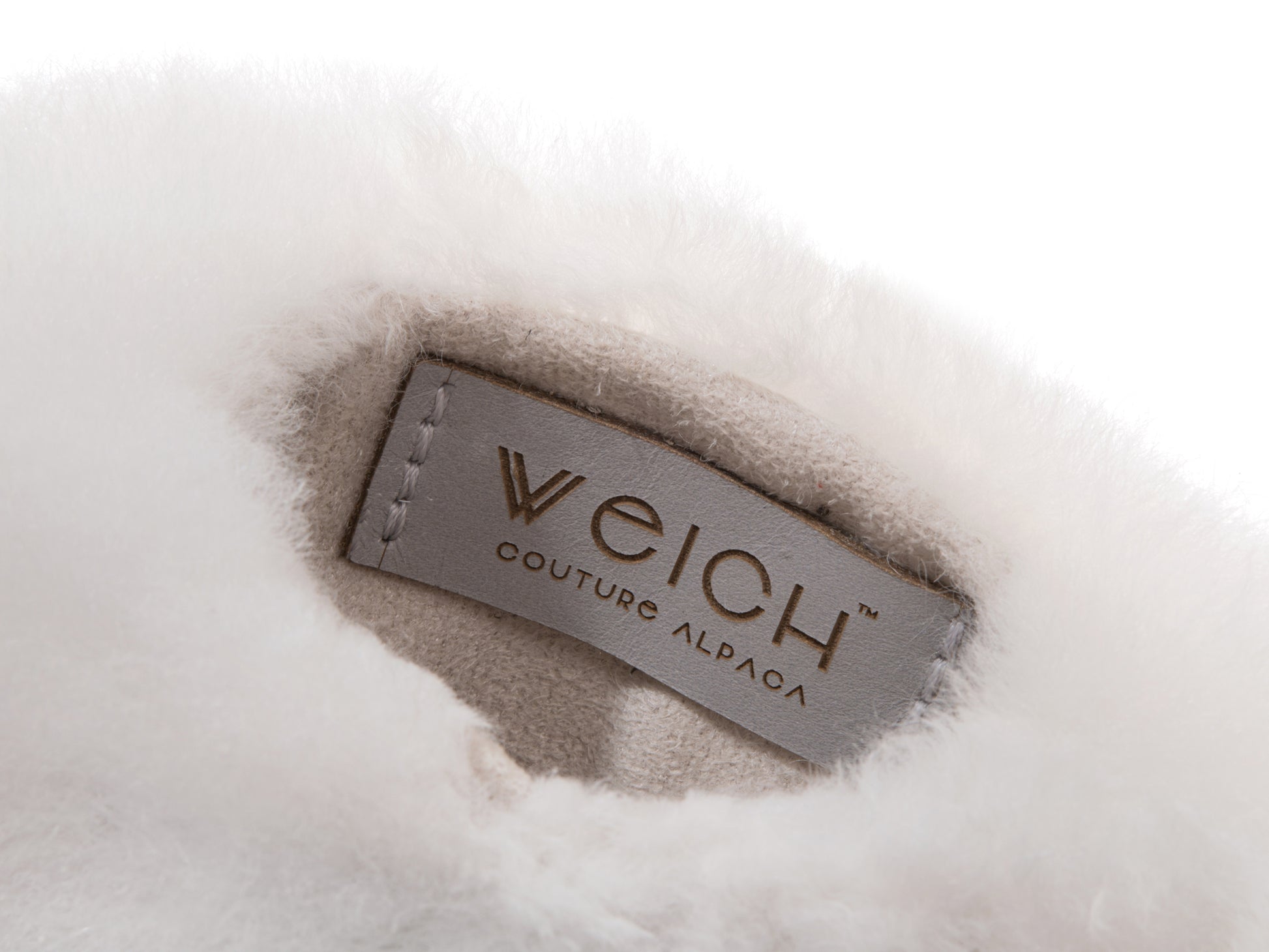 Inside view of the plush alpaca fur CALMO cover with WECH Couture Alpaca label.