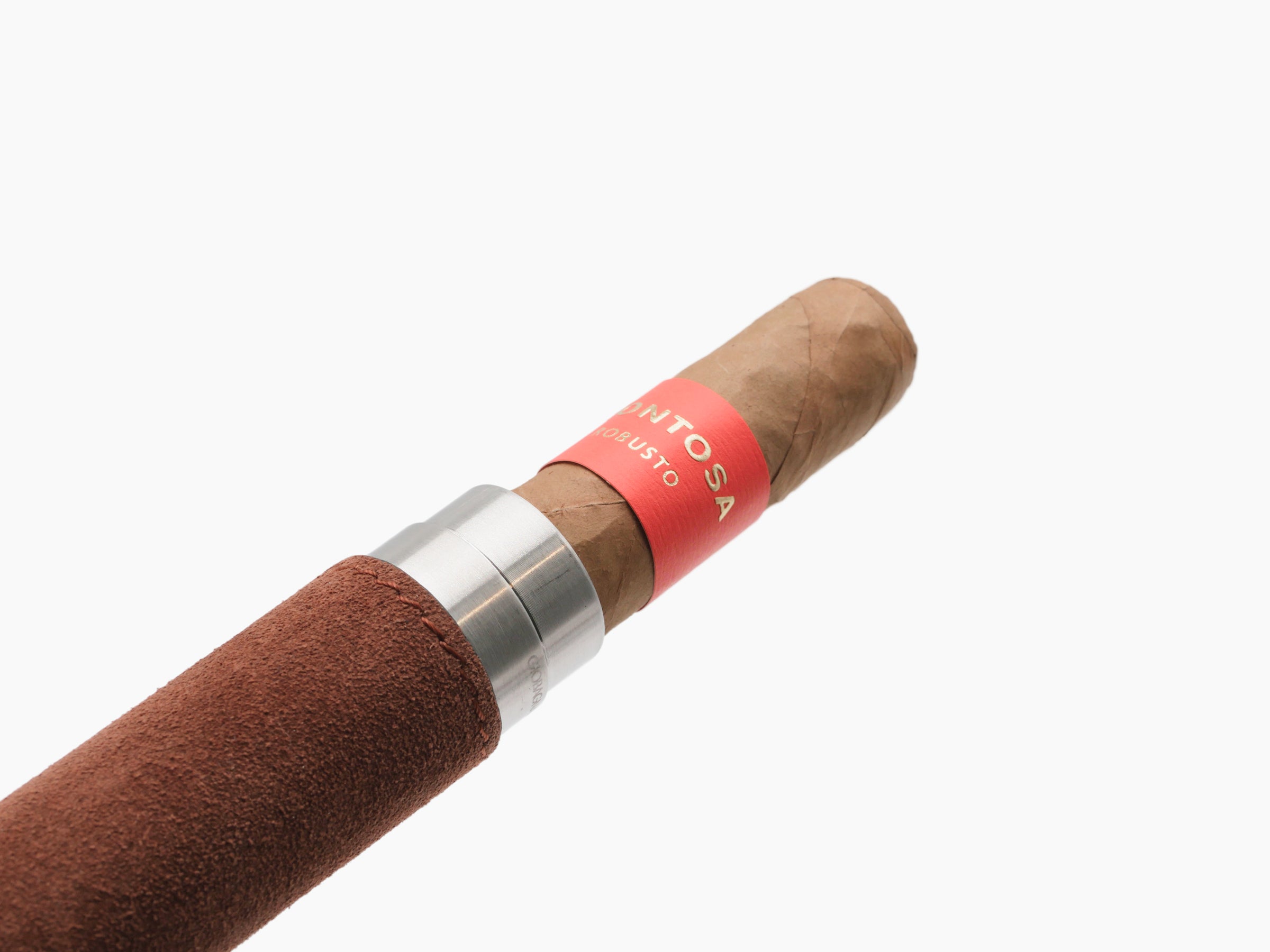 Close-up of a brown leather wrapped cigar holder with a metal collar next to a cigar with a red band