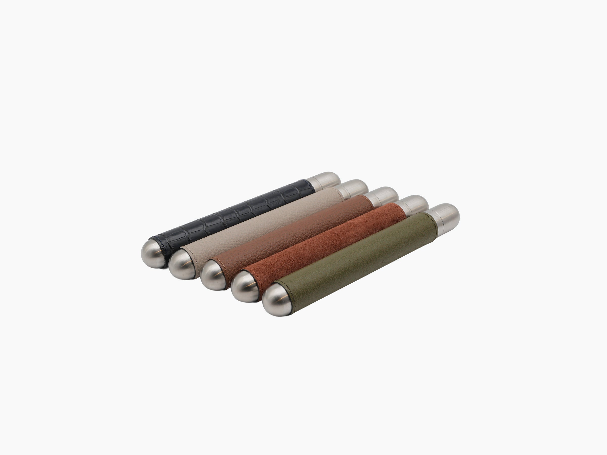 Five leather wrapped cigar holders with metal caps in black beige brown rust and olive green lined up diagonally
