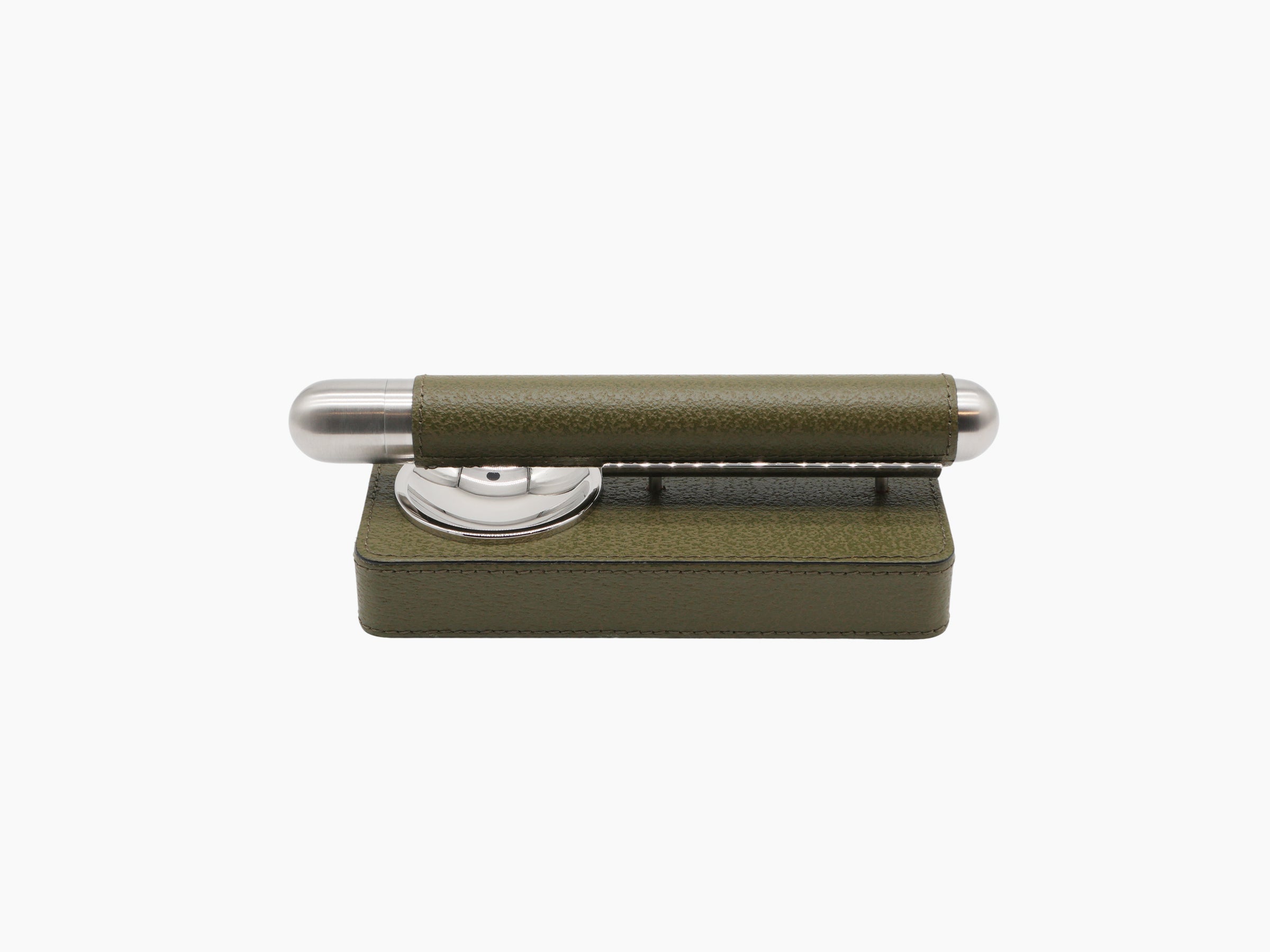 Olive green cigar holder set with chrome ashtray and matching leather case; a cigar rests on the ashtray