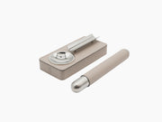 Stone color Cigar Holder Gift Set with beige leather case and chrome cigar holder resting on top.