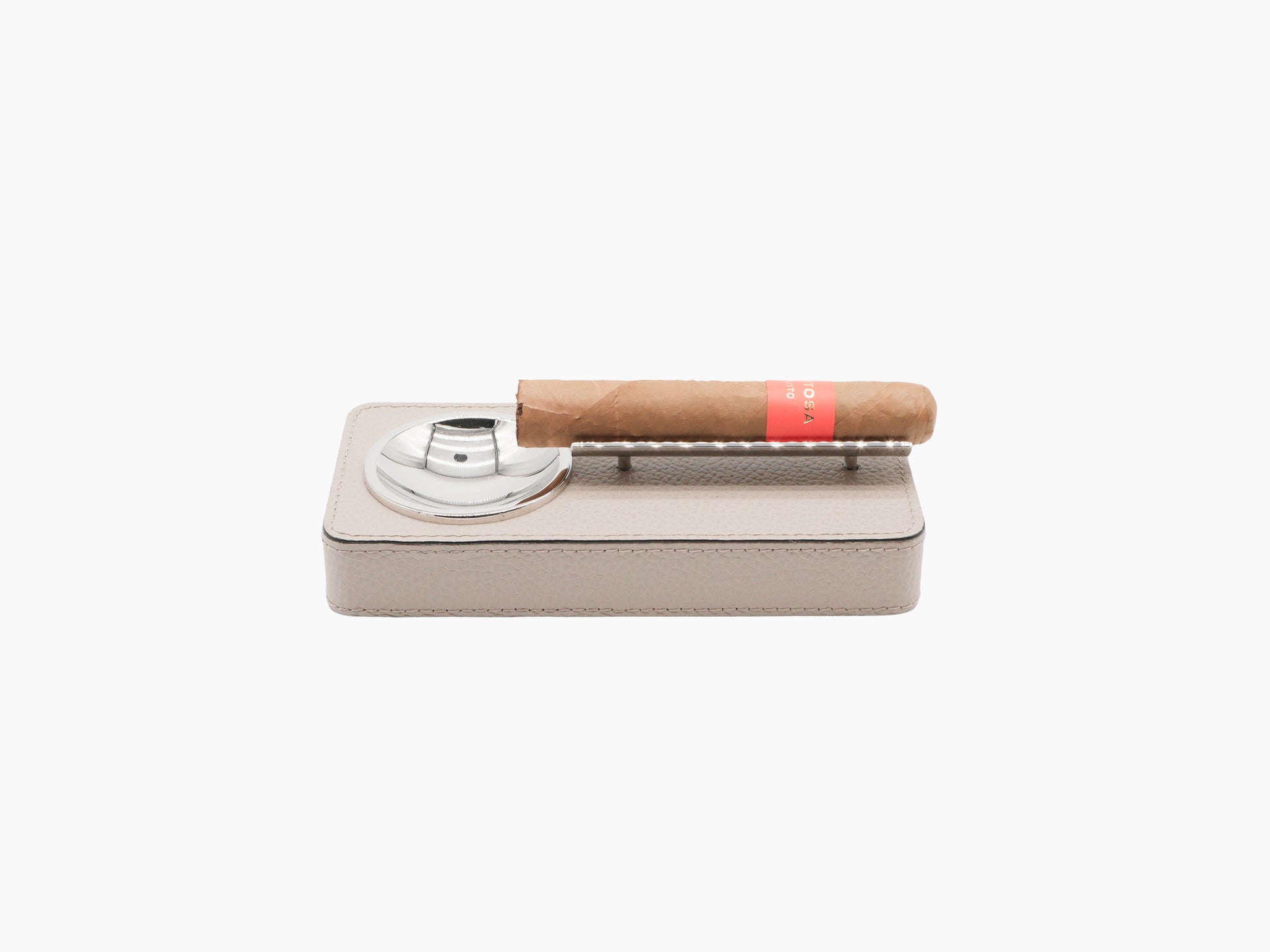 Navy blue crocodile pattern cigar holder gift set with cigar resting on chrome ashtray and a matching blue case