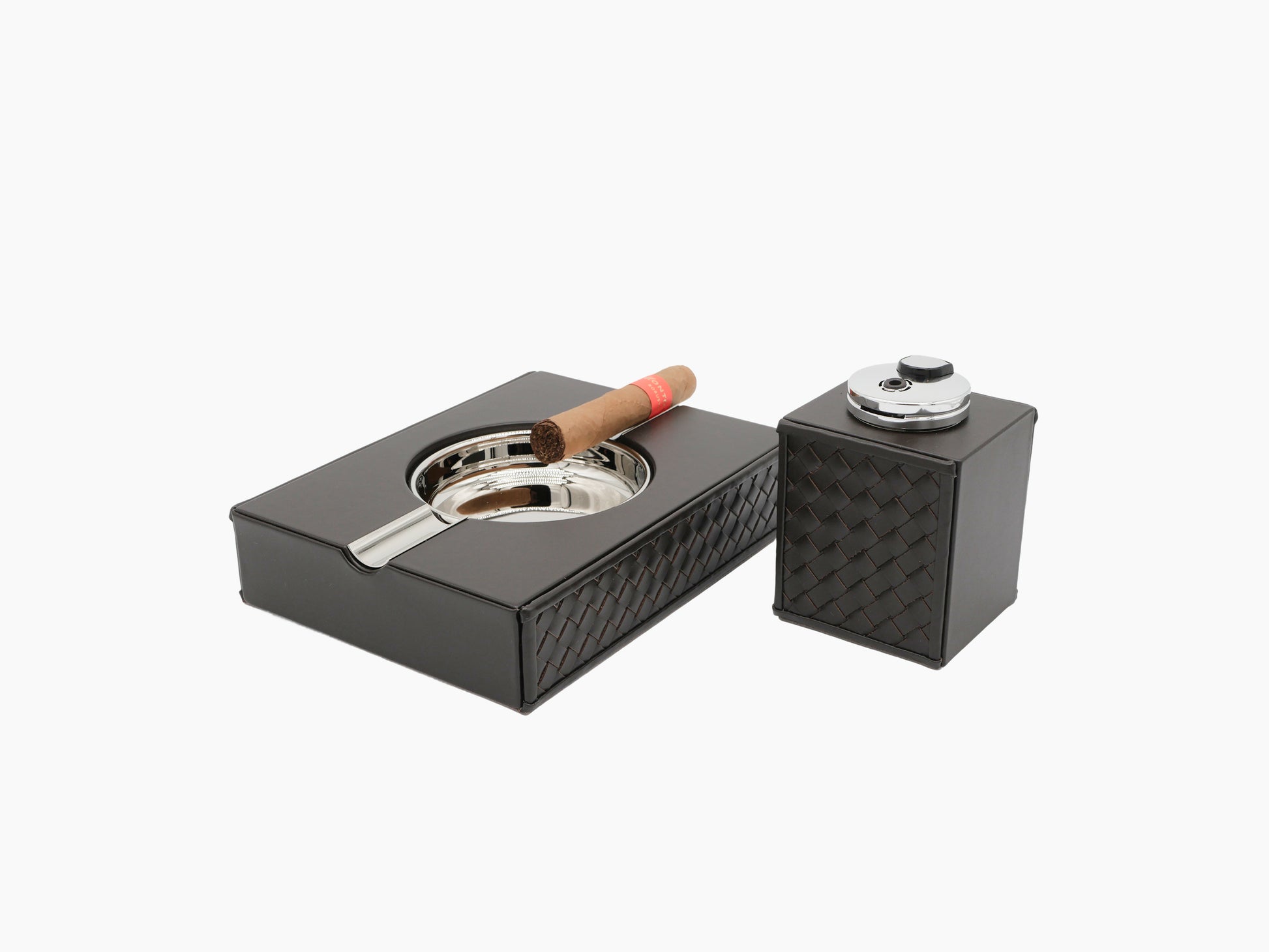 Riviere handwoven leather cigar accessories set with a sculptural metal ashtray and a matching lighter cube