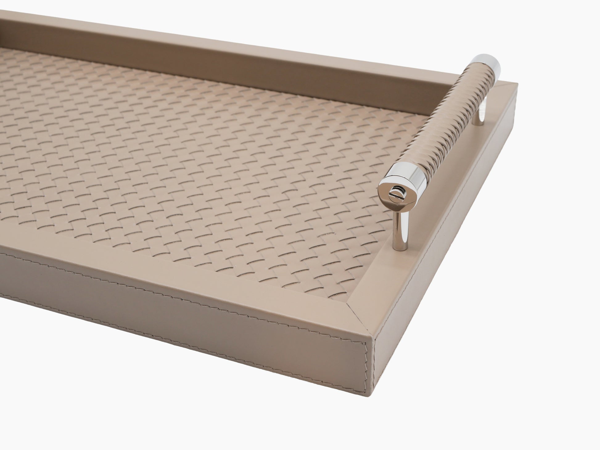 Close-up of the Diana tray showing woven interior and leather handles