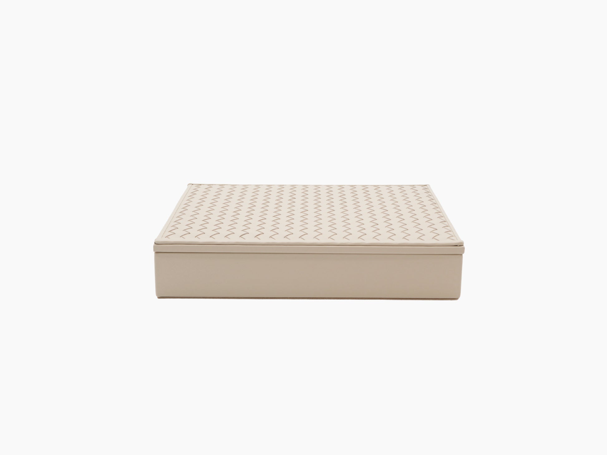 Beige leather Eva Domino Game Set box with a handwoven lid, shown closed.