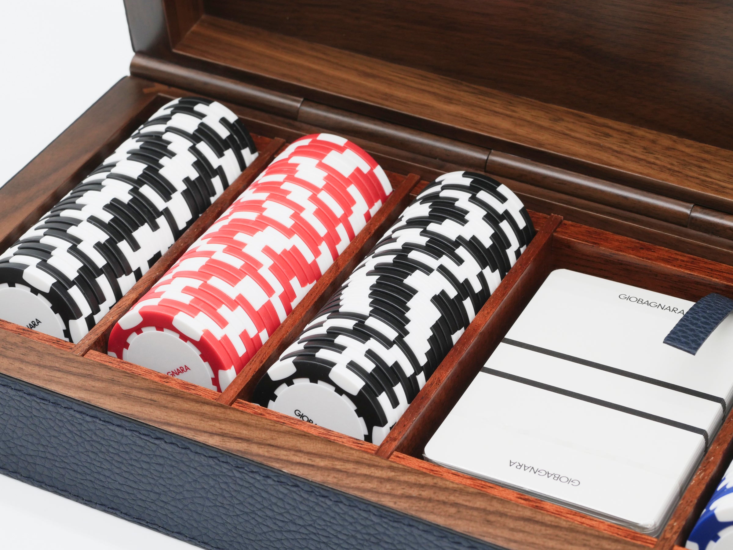 Open walnut and mahogany poker case with leather lining and three stacks of poker chips plus a premium deck of cards