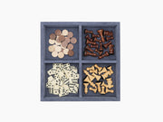 Three in one chess draughts and dominoes set in a multi compartment tray showing discs dominoes and wooden chessmen